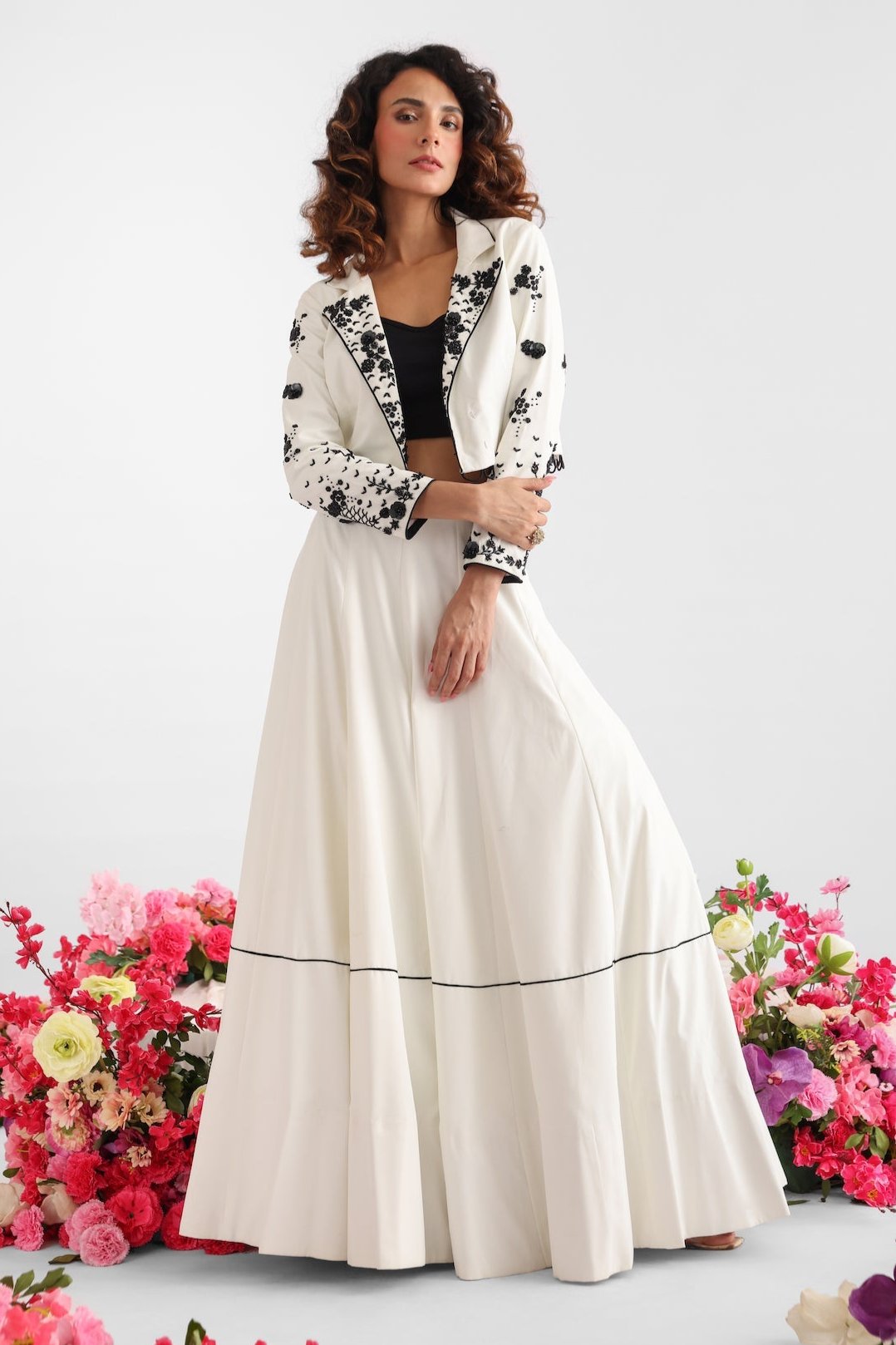 White and black lehenga set with cropped top, flowing lehenga, and embroidered floral jacket – Golden Muslin