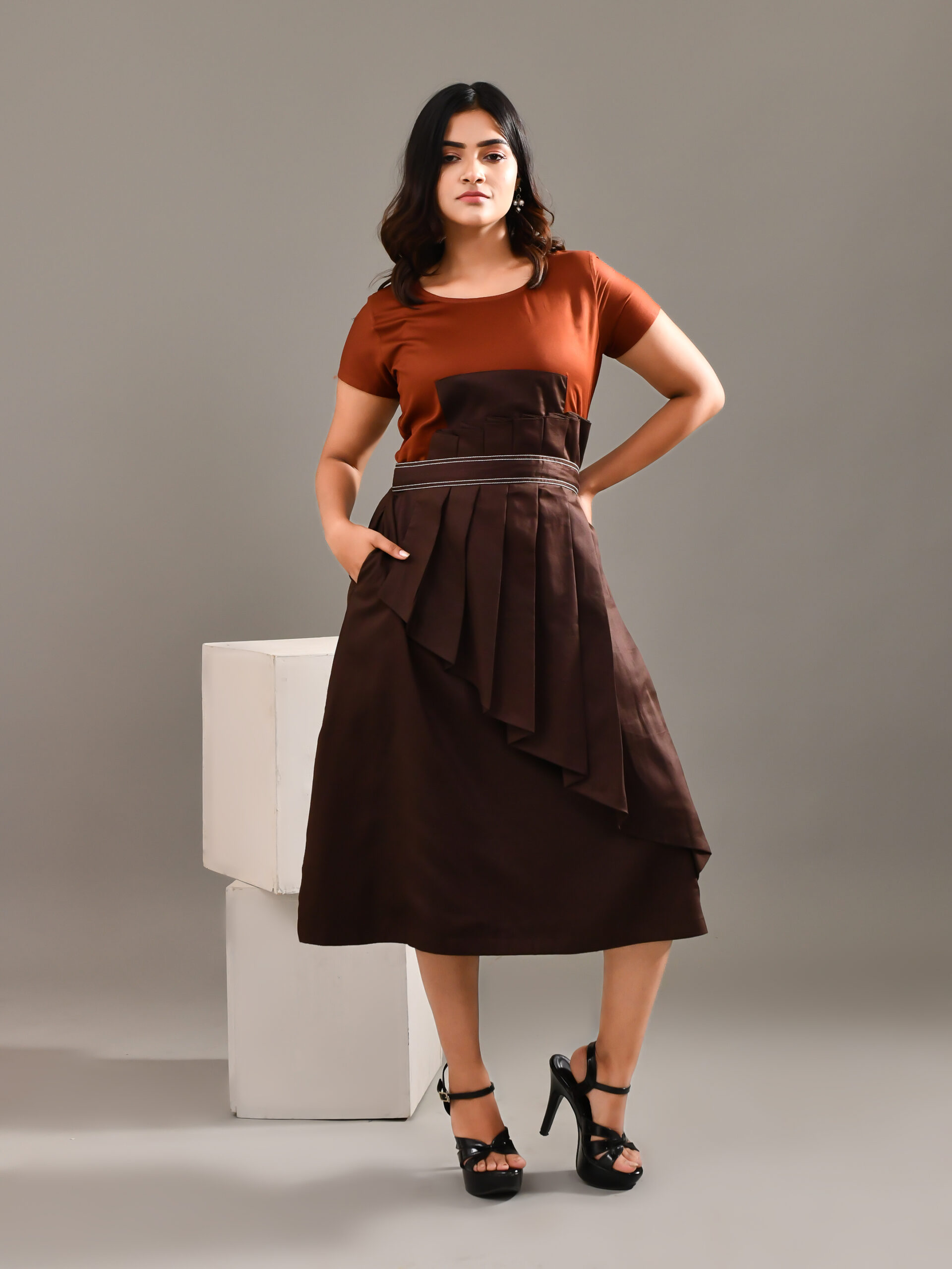 Rust and brown blended cotton midi dress with geometric color blocking and pleated layered detailing – Golden Muslin