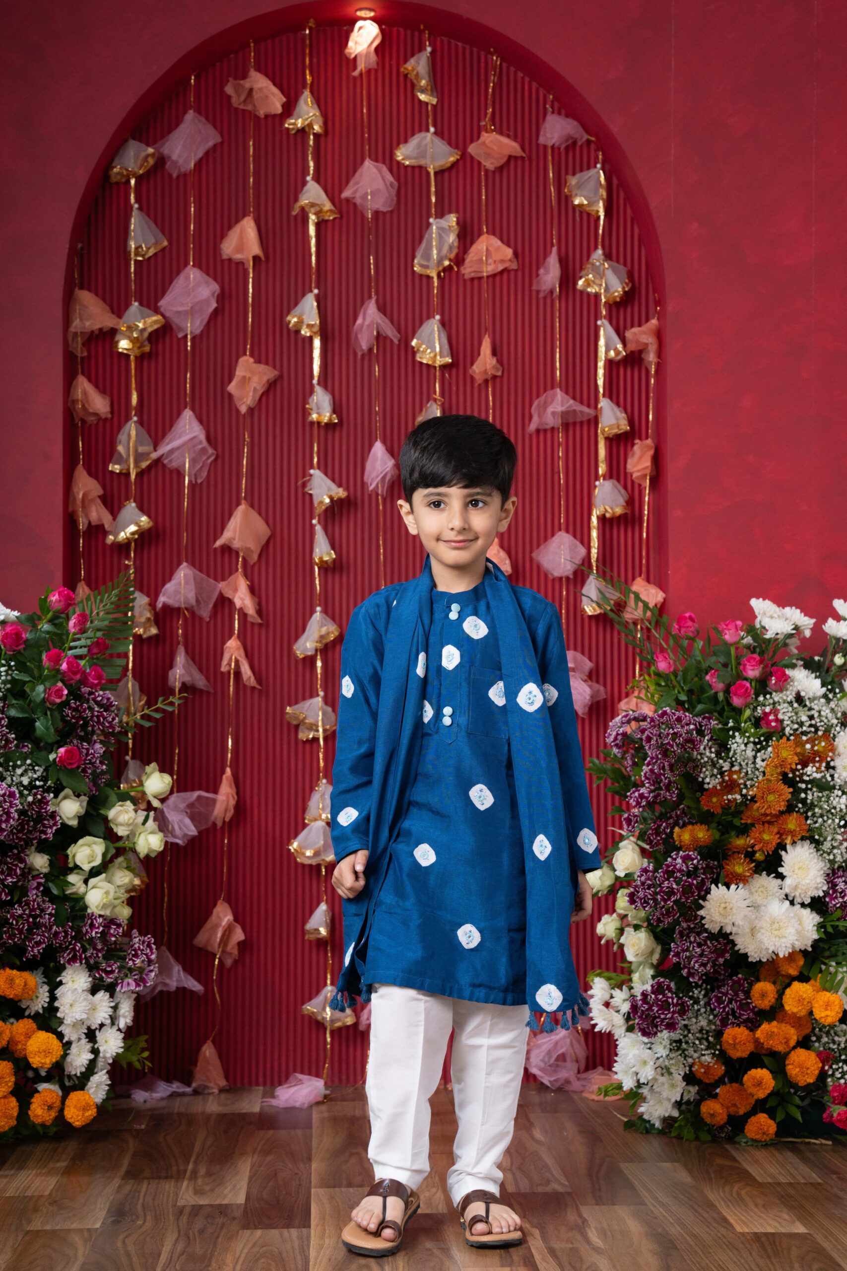 Blue tie-dye kurta with white churidar pants and matching blue scarf – Golden Muslin