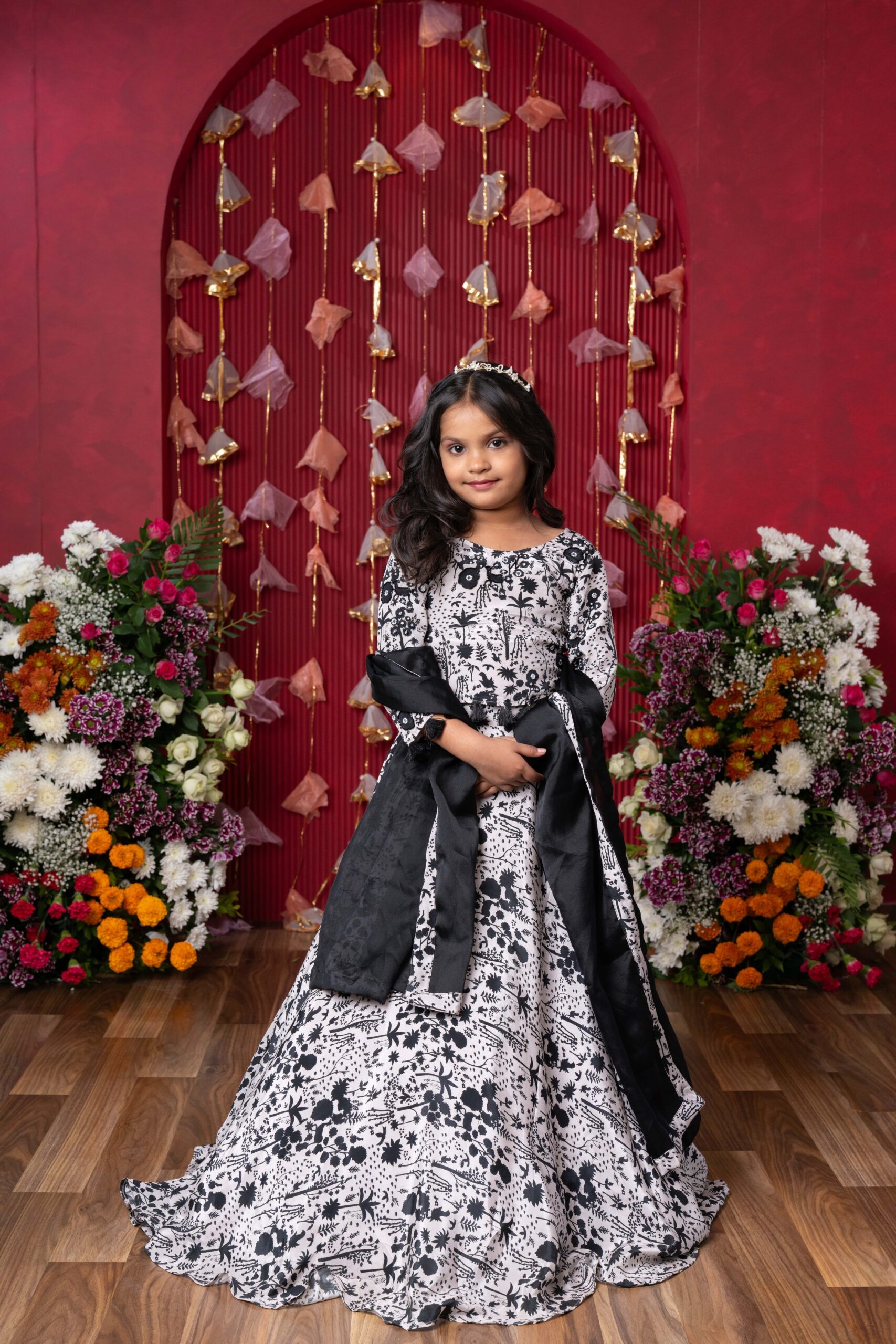 Black-and-white floral printed crop top with matching flared lehenga and solid black textured dupatta – Golden Muslin