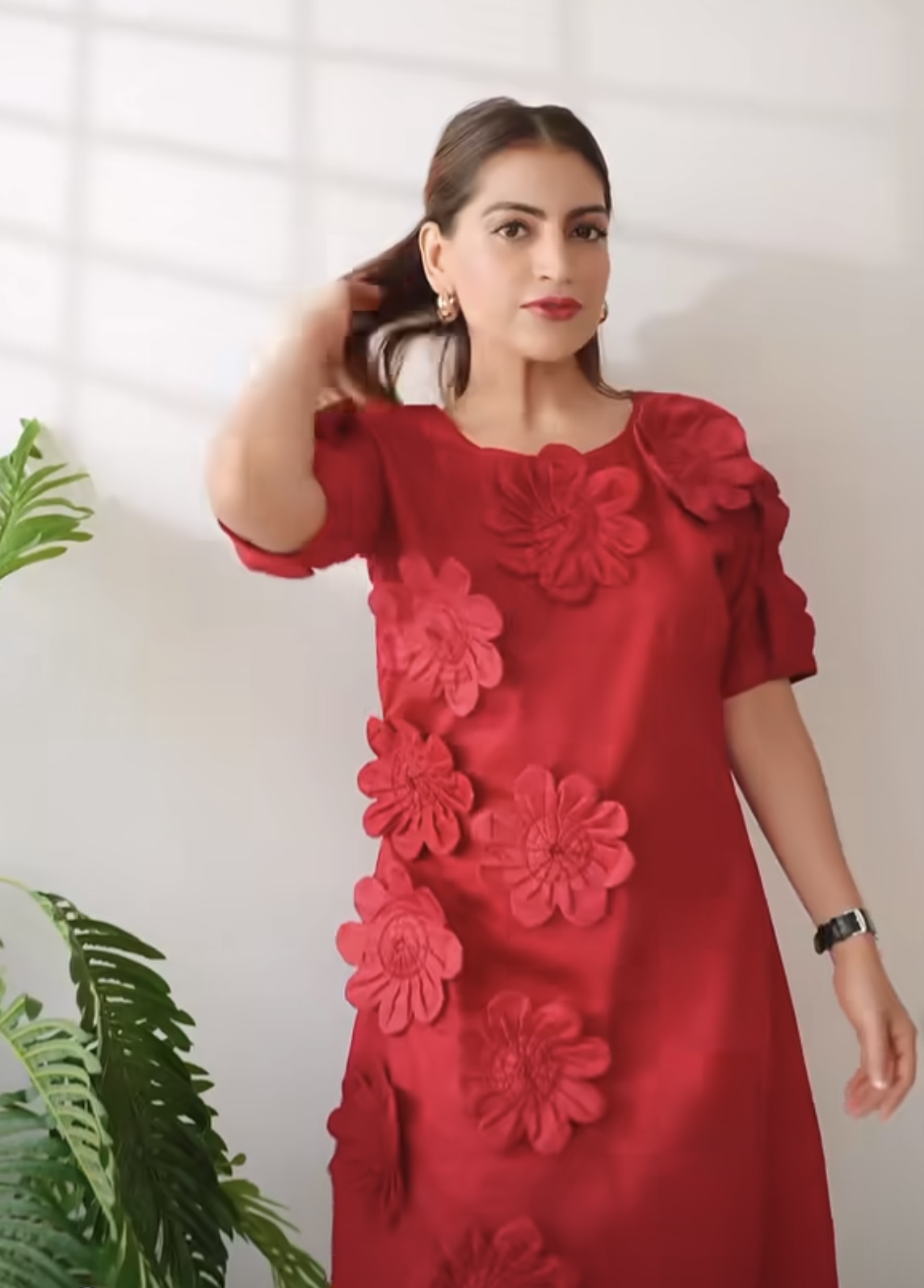 “Golden Muslin crimson red blended cotton dress with handcrafted floral patchwork and a refined, flattering silhouette.”