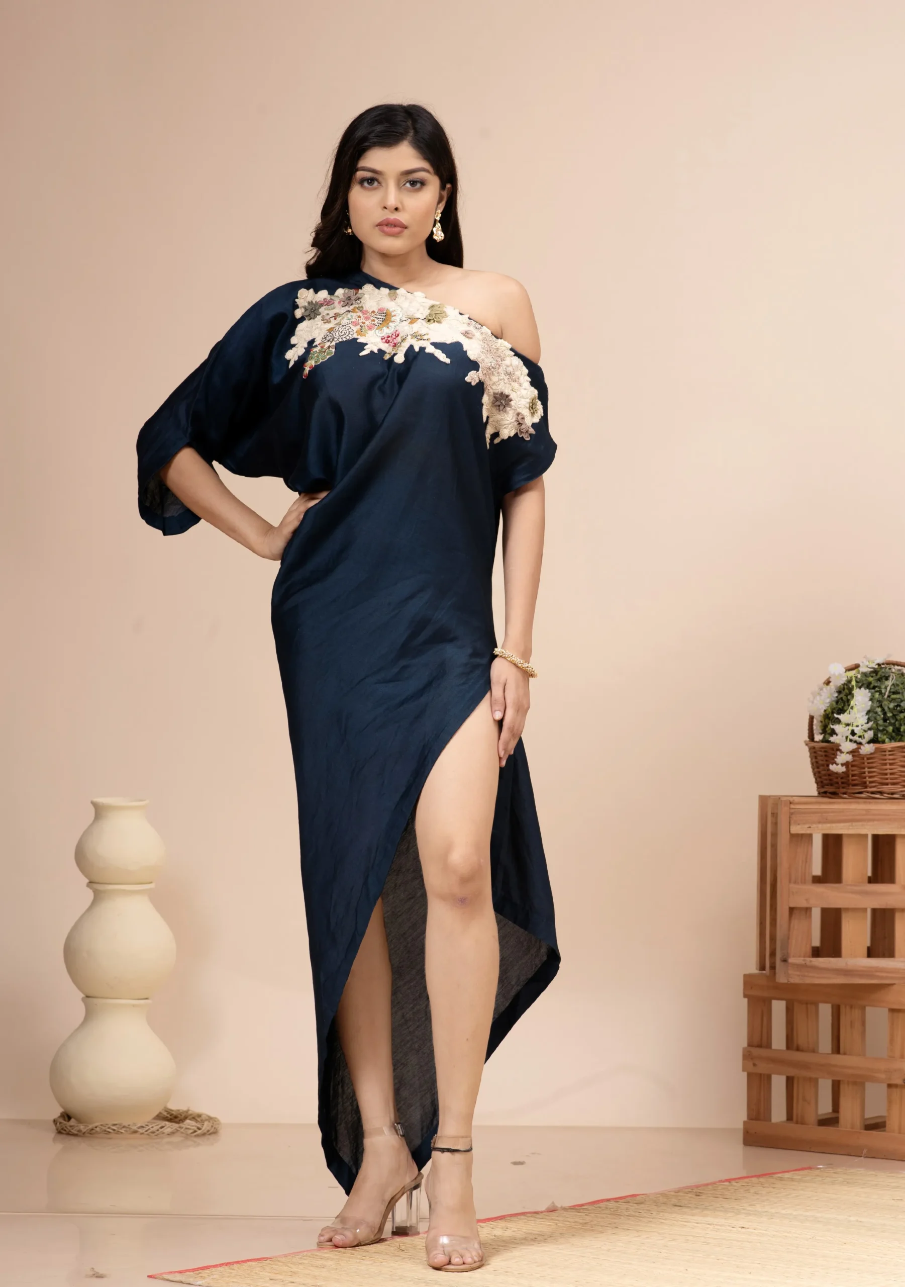 Oxford blue off-shoulder chanderi tunic with floral embroidery By Kumar Rahul from the house of Golden Muslin.