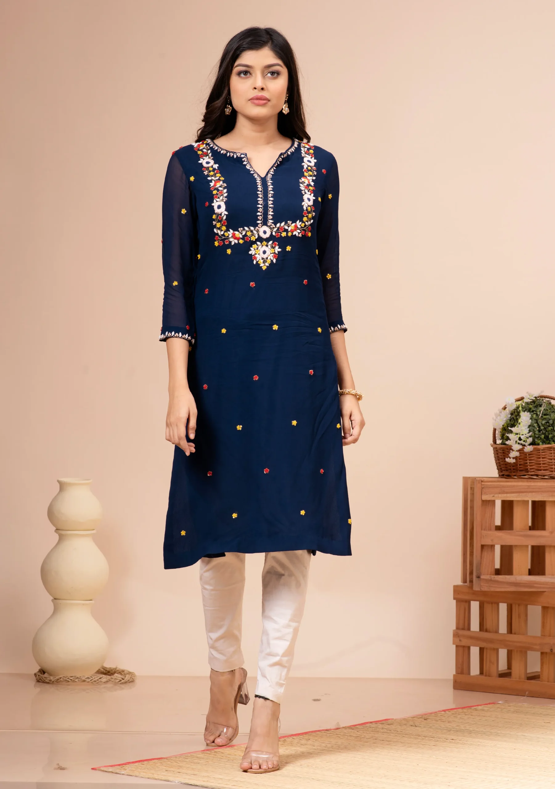 Royal blue floral embroidered georgette kurta with ivory pants By Kumar Rahul from the house of Golden Muslin.