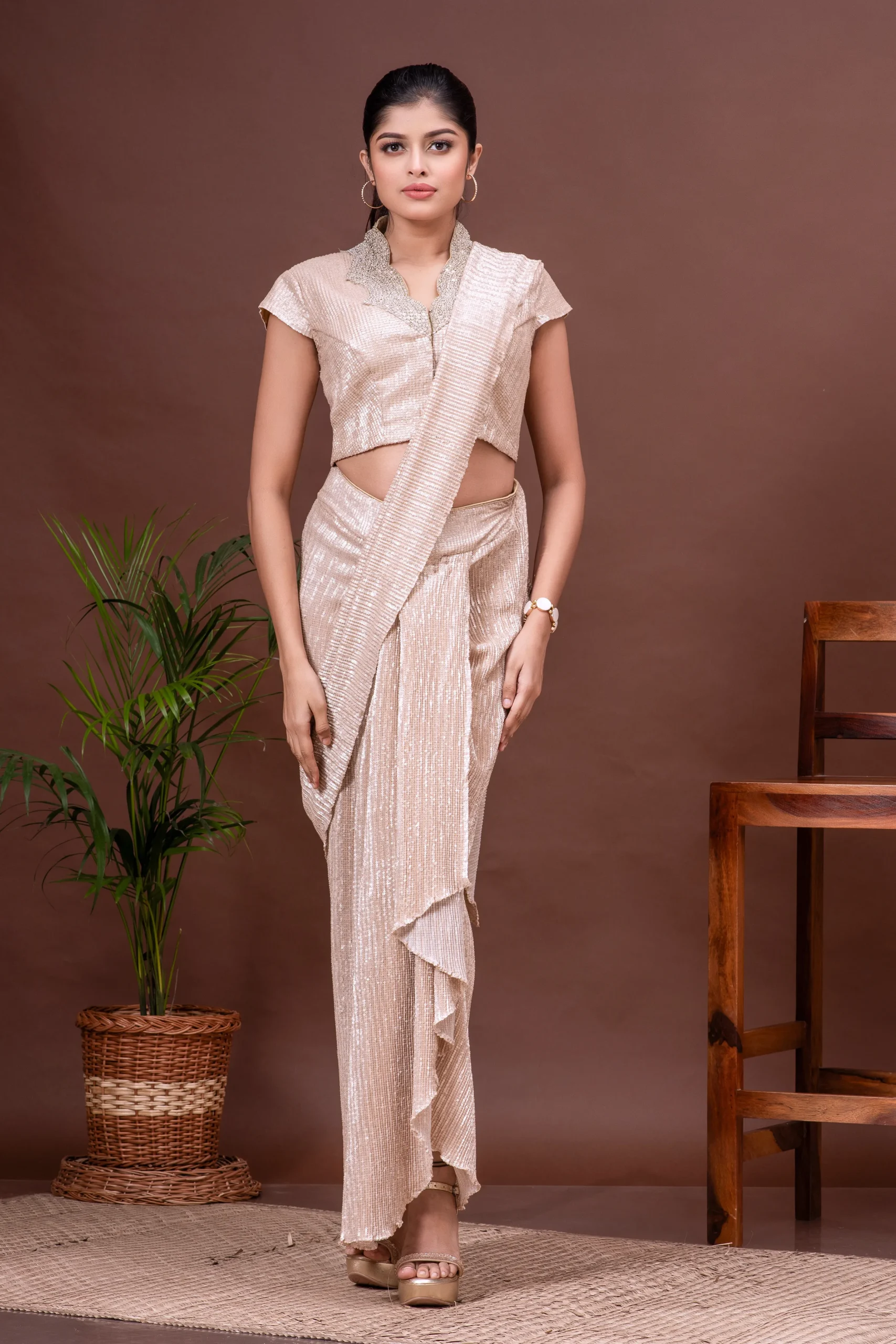 White gold shimmer pre-draped saree and embroidered blouse by Kumar Rahul from the house of Golden Muslin.