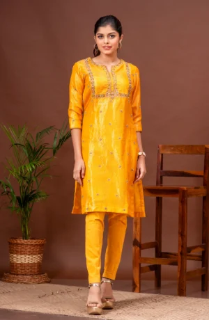 Deep saffron zari kota doriya kurta with zardosi detail from the house of Golden Muslin by Kumar Rahul.