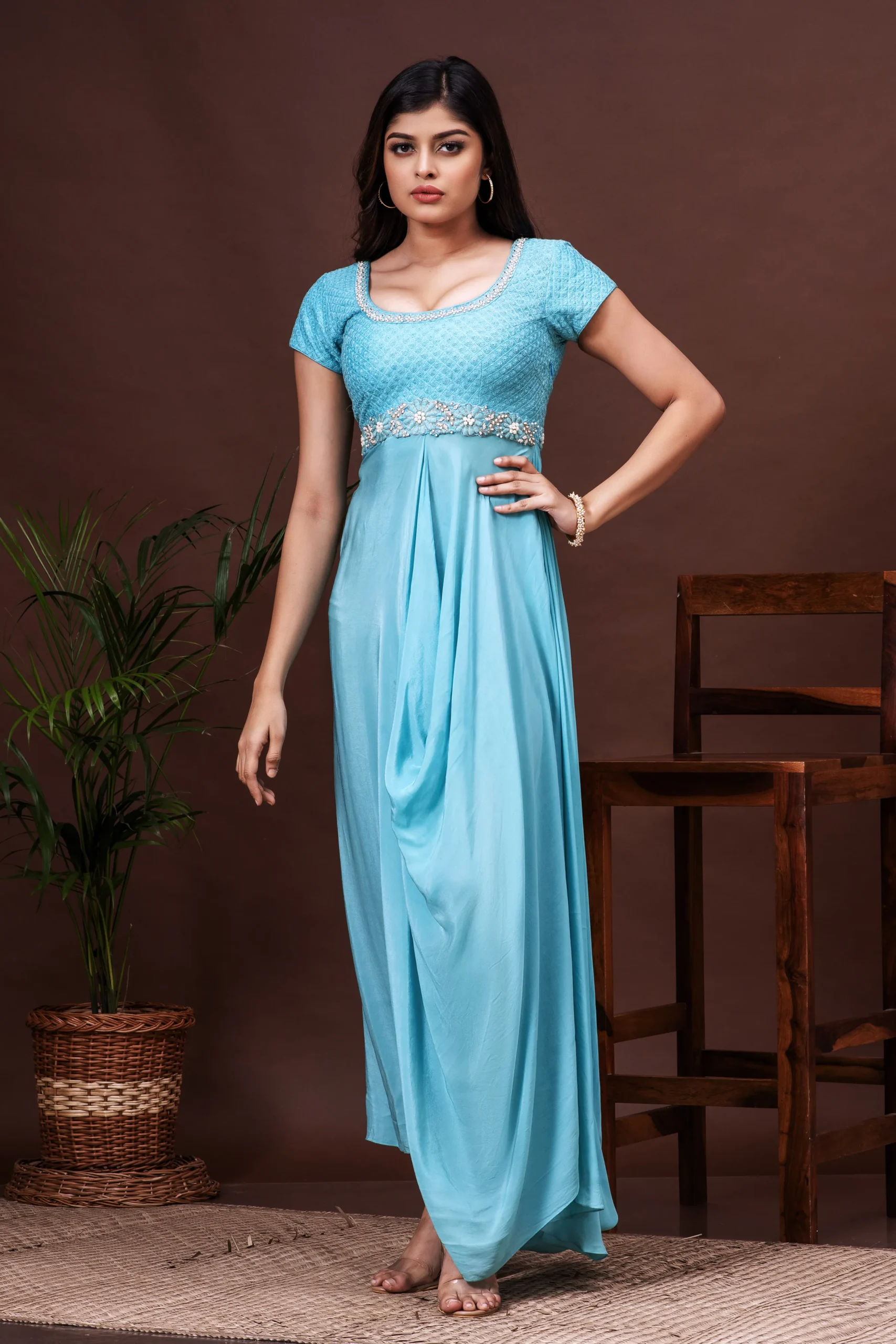 River blue crepe dress with scoop neck and cowl draping By Kumar Rahul from the house of Golden Muslin.