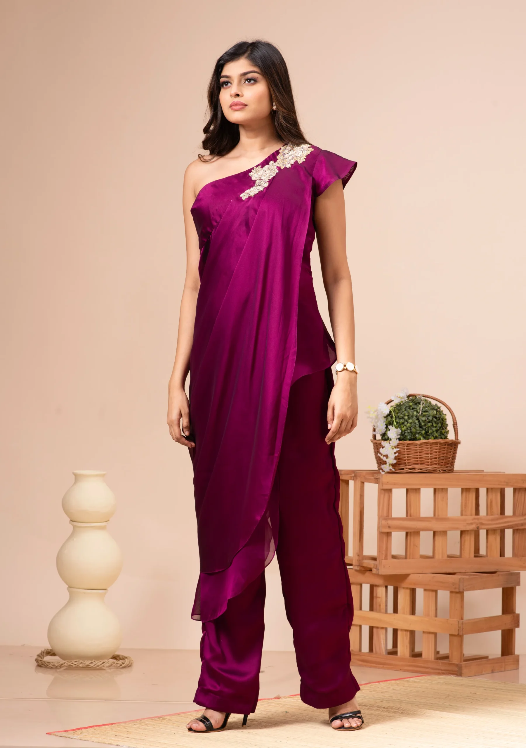 Wine silk tulip draped tunic with placement embroidery and matching pants by Kumar Rahul from the house of Golden Muslin.