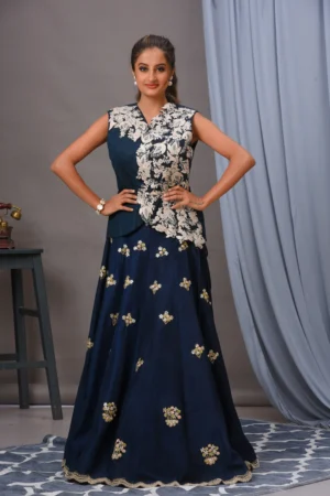 Embroidered Persian blue Bamberg silk skirt with scallop edges and a navy raw silk jacket by Satya JB from the house of Golden Muslin.