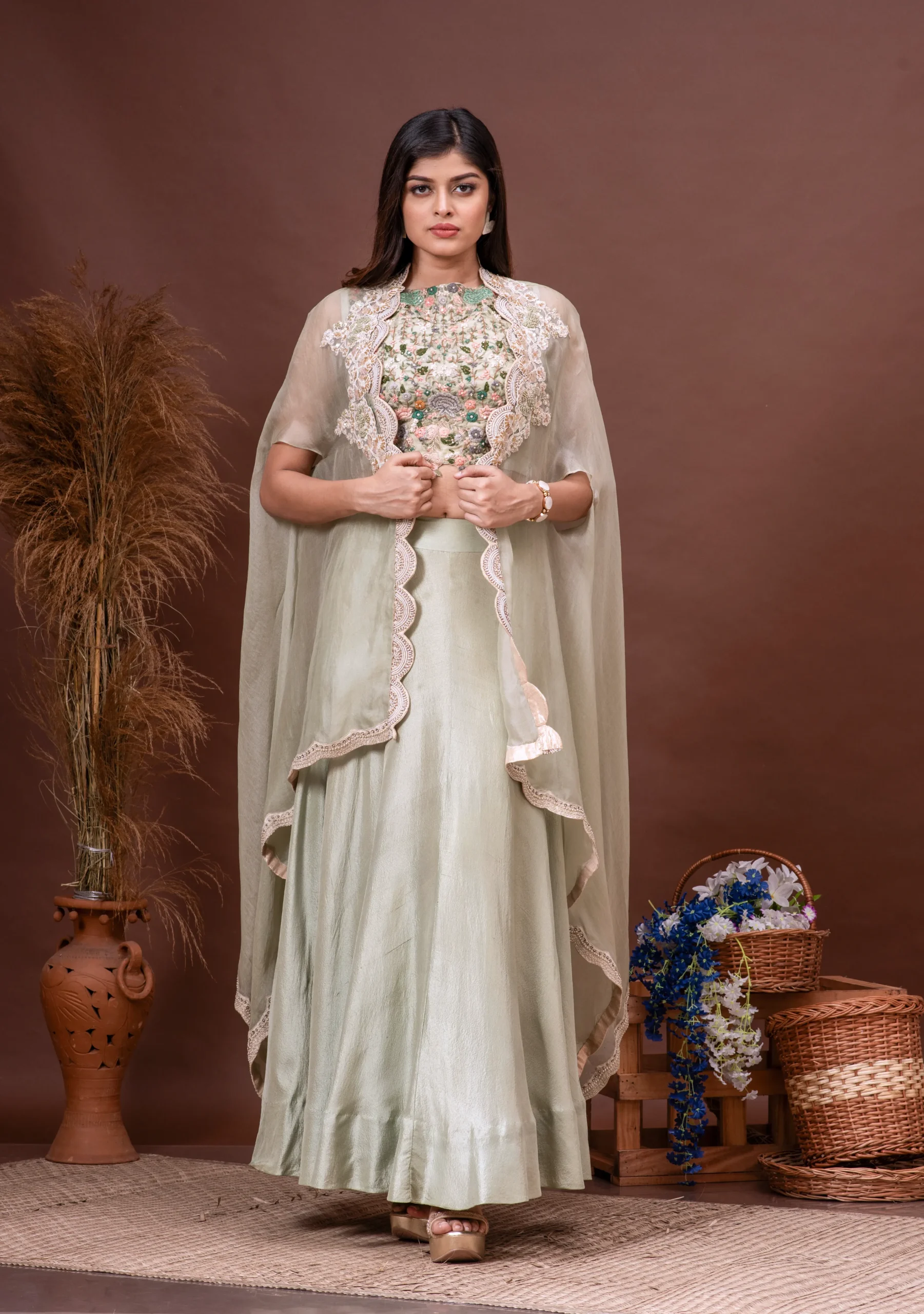 Mint green silk organza cape with scalloped embroidery and dola blouse from the house of Golden Muslin by Satya JB.