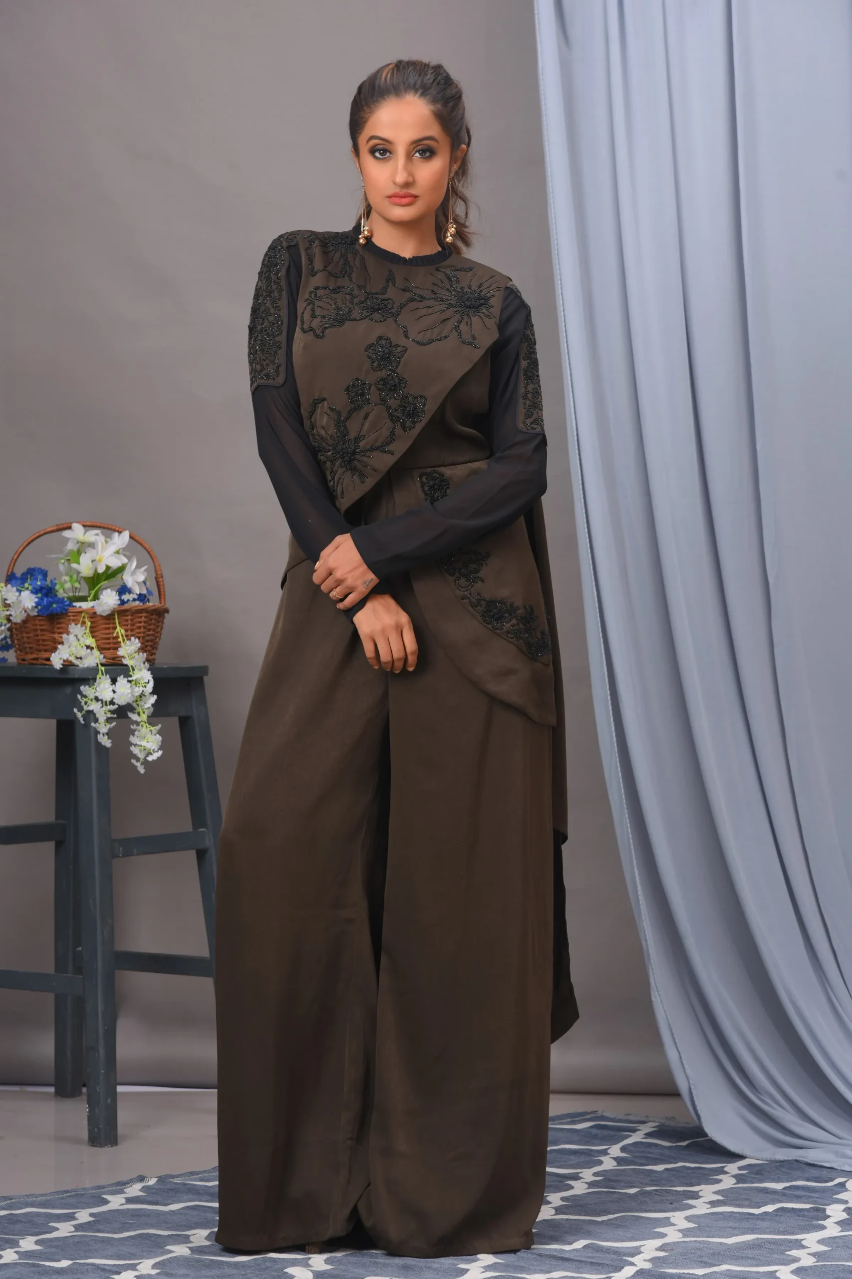 Indo-fusion jumpsuit by Vivek Kumar from Golden Muslin with cutdana work and shoulder drape detail.