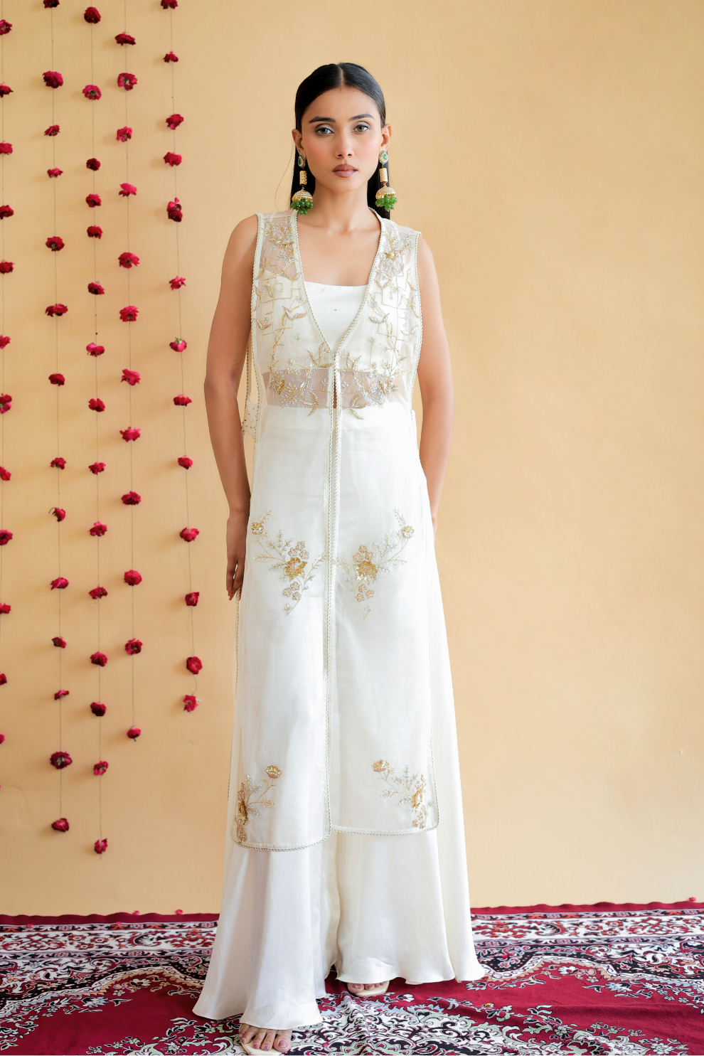 Ivory three-piece palazzo set by Golden Muslin featuring a strappy modal silk bustier