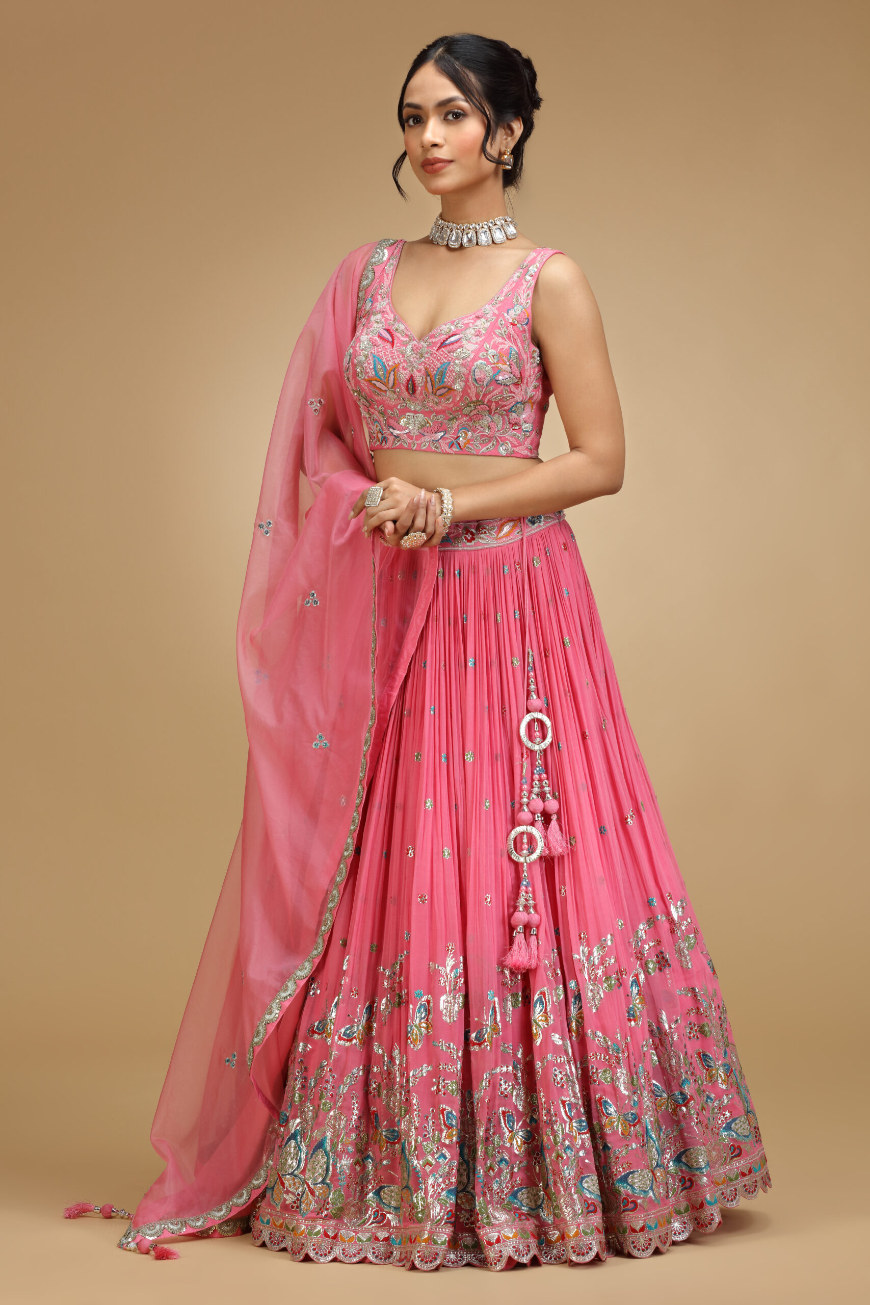Golden Muslin pink tissue embroidered lehenga set with sleeveless embroidered blouse