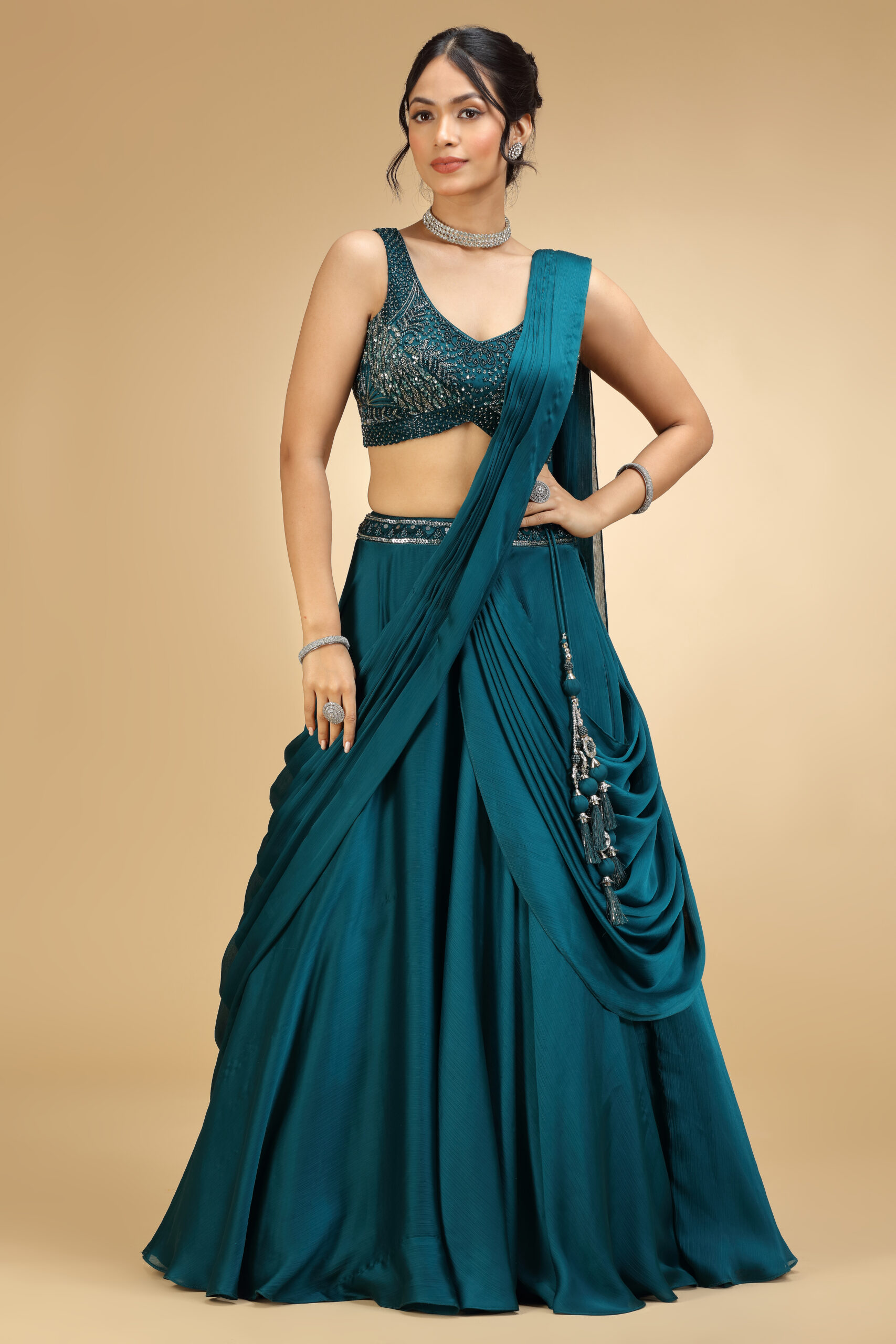 Golden Muslin teal poly silk embroidered pre-draped saree with matching embroidered blouse