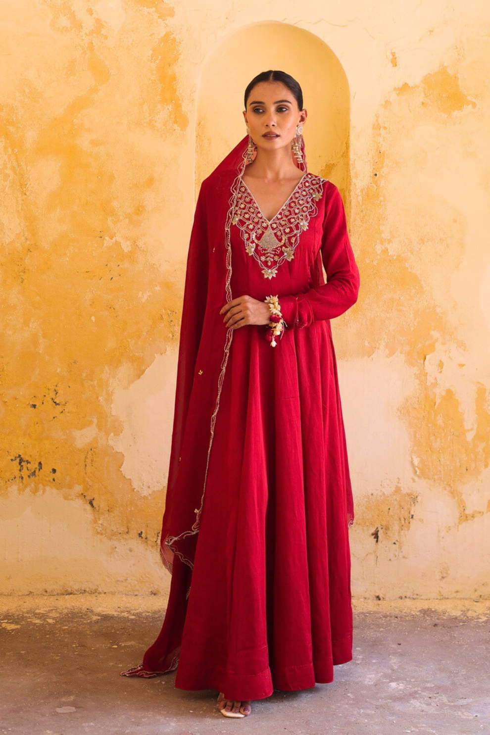 Crimson floor-length linen silk Anarkali with intricate silver embroidery