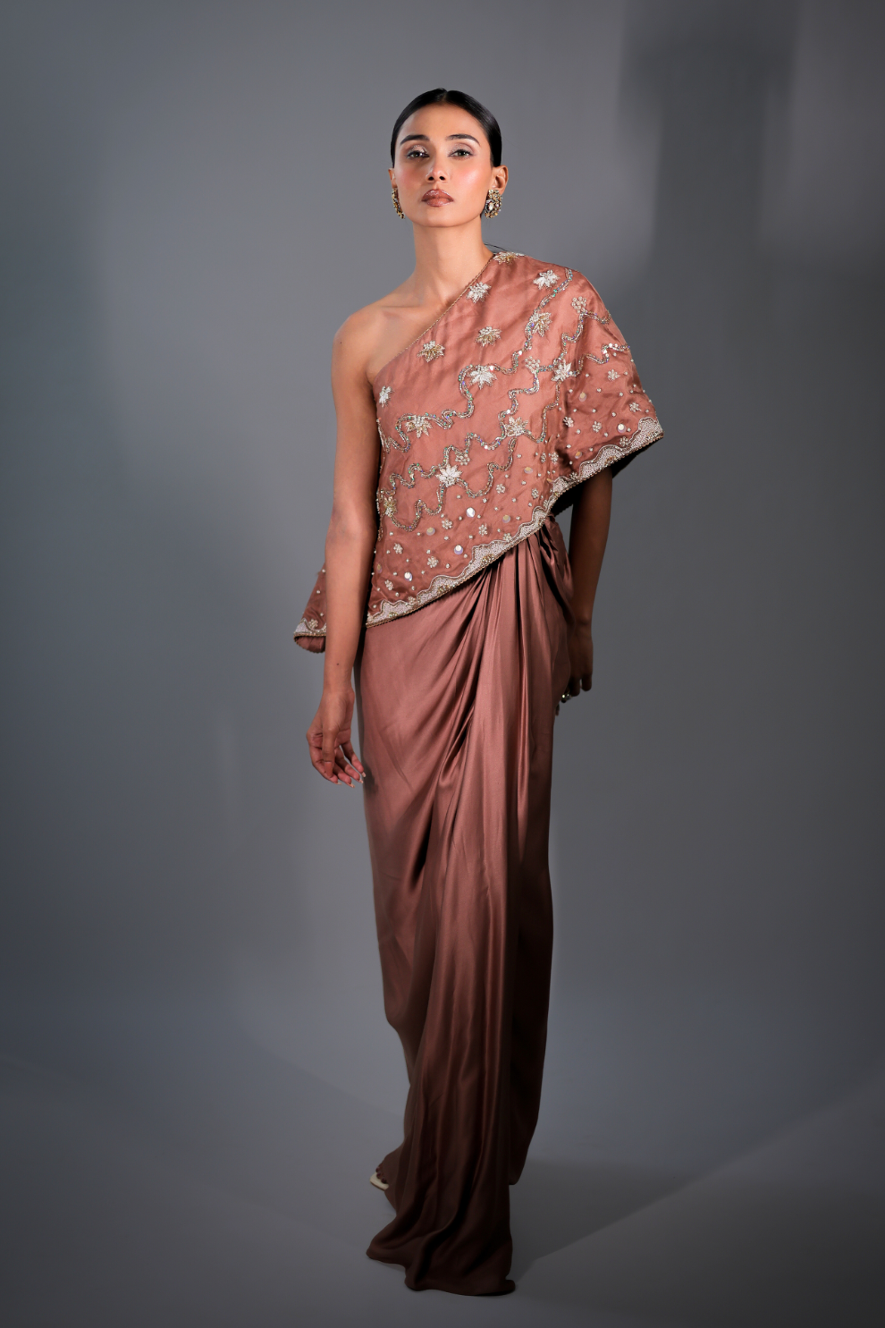 Rosy brown modal silk three-piece set by Golden Muslin featuring a one-shoulder embroidered cape