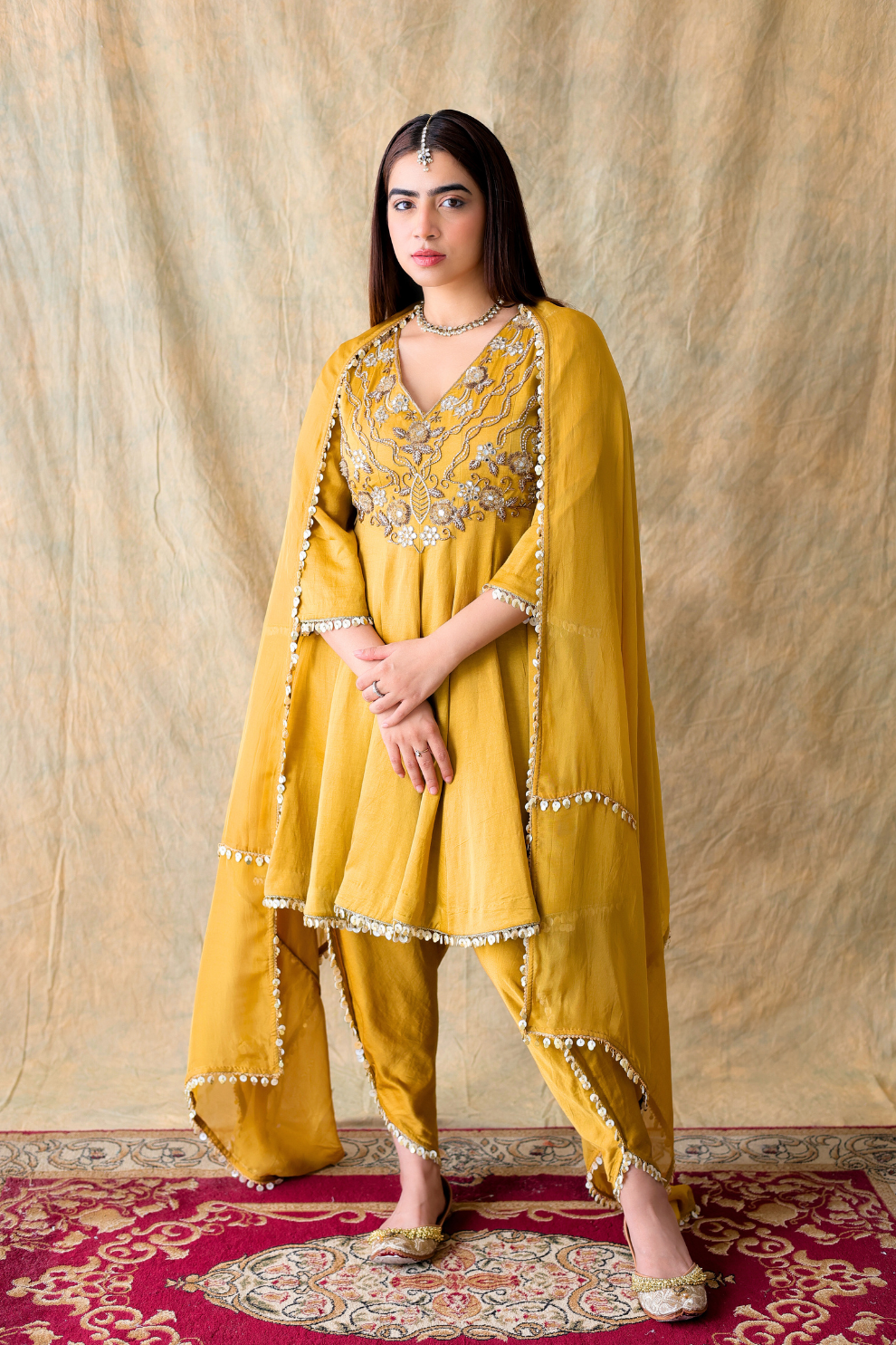 Mustard yellow linen silk and organza embroidered Anarkali kurta set by Golden Muslin