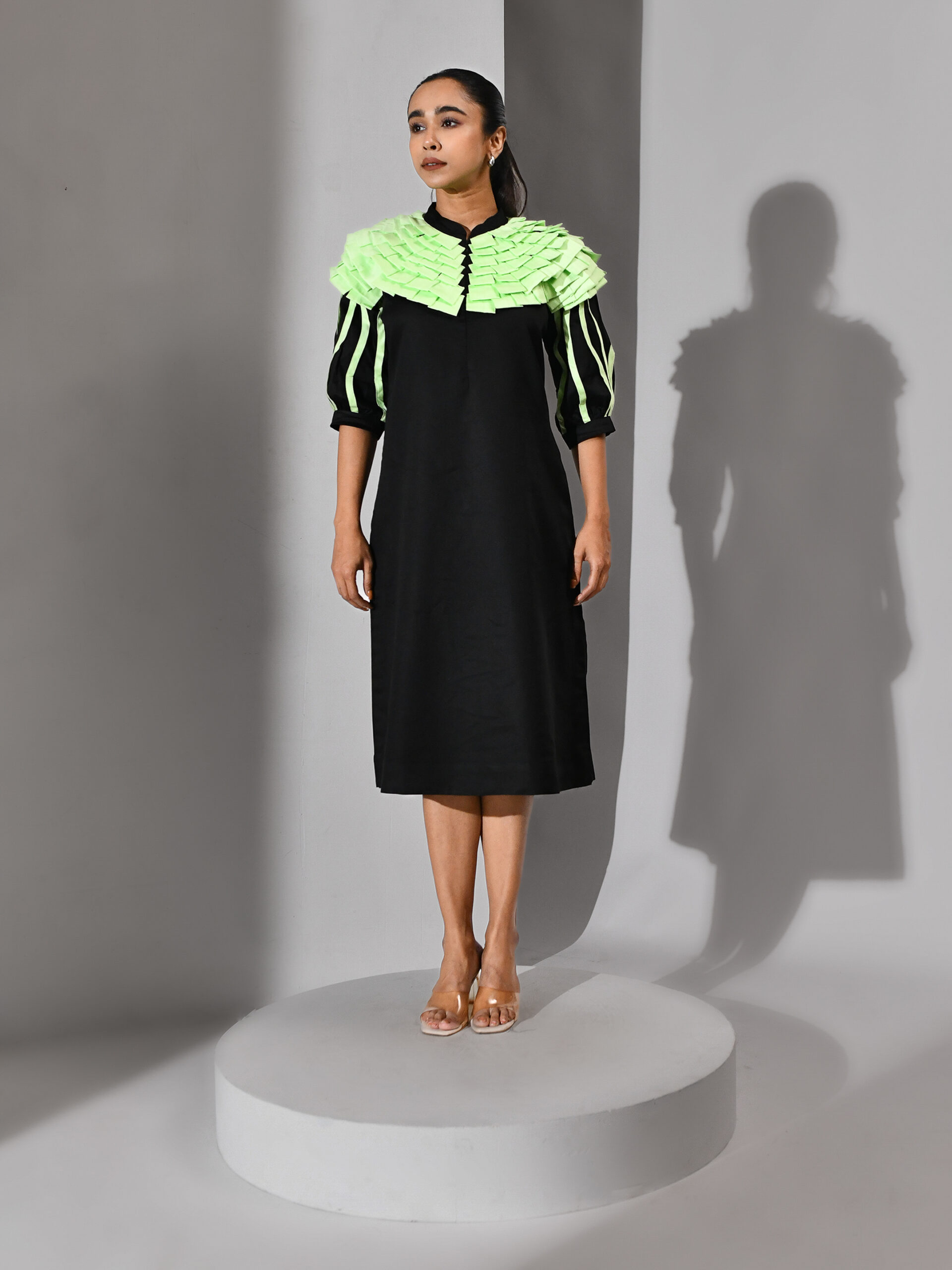 Golden Muslin black and mint green cotton dress with folded mint tassel shoulder detailing and modern sculptural design