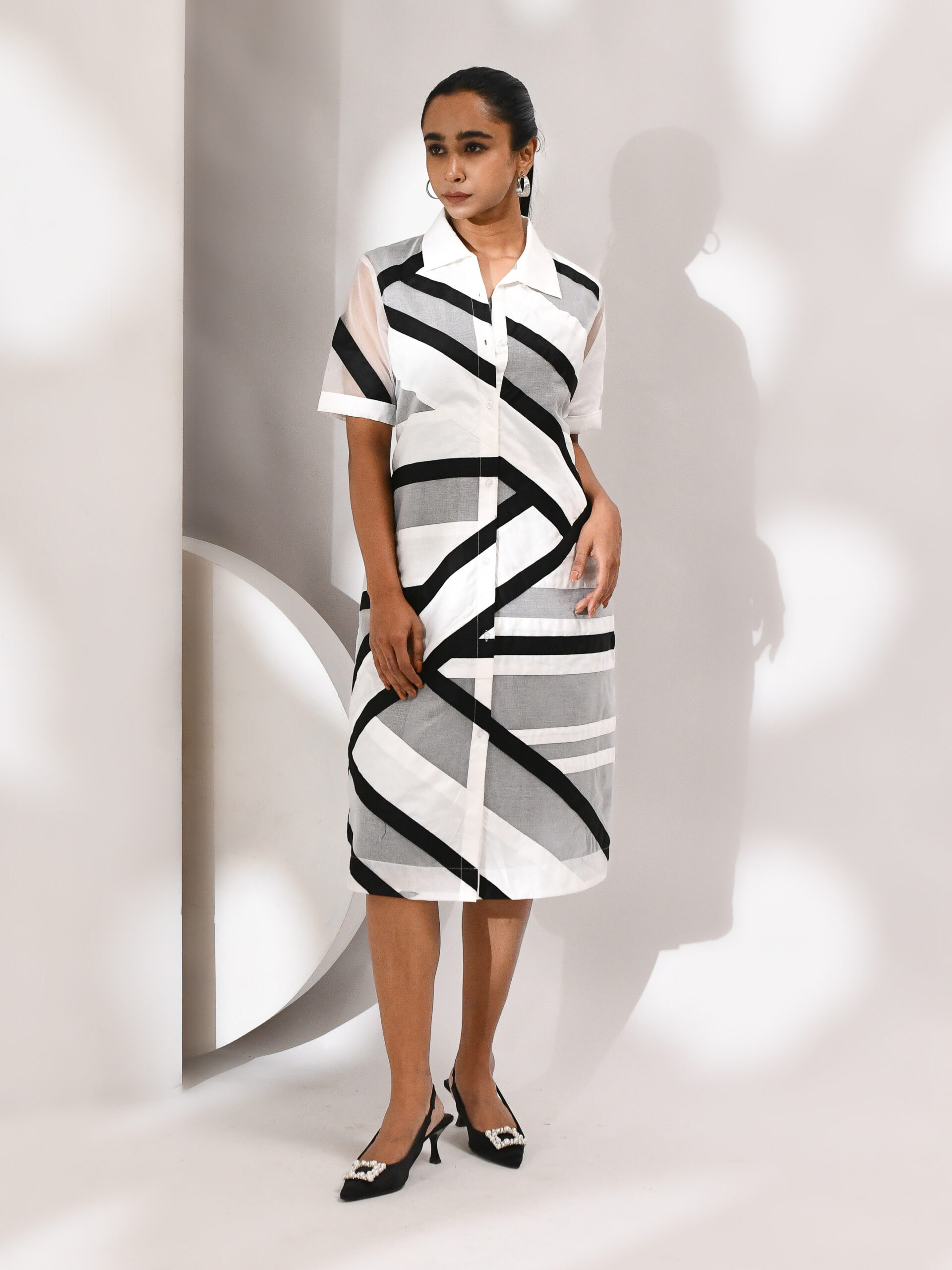 White and black two-piece dress with cotton inner and sheer organza overlay featuring bold linear patterns – Golden Muslin