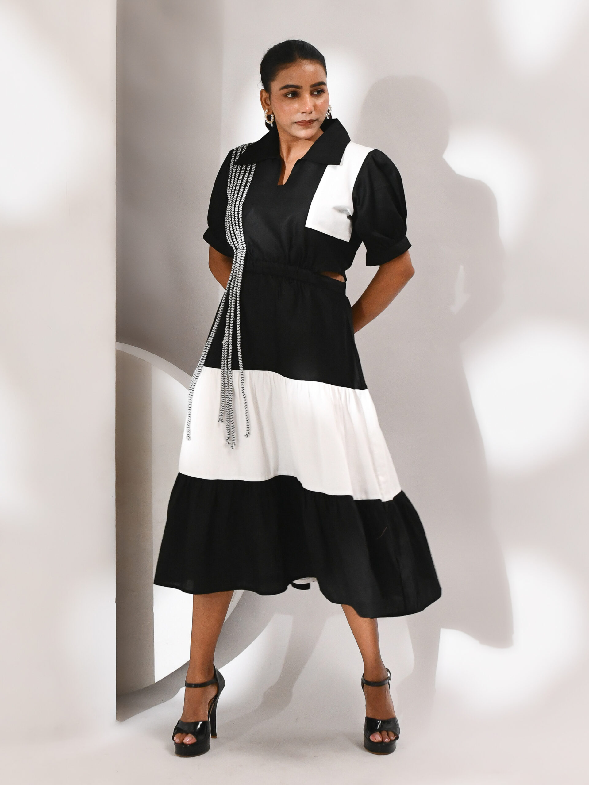 Black and white tiered cotton dress with puff sleeves