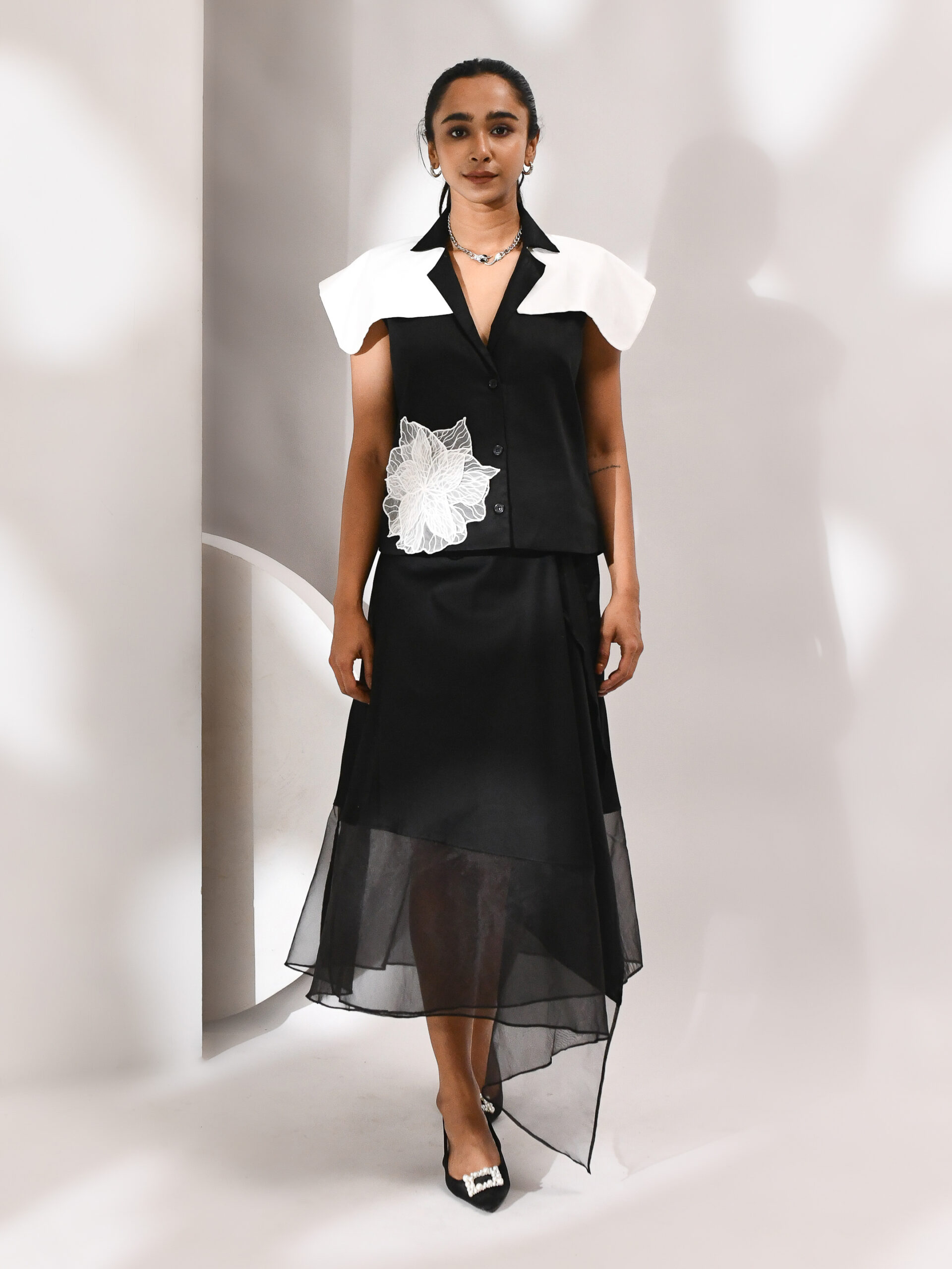 Golden Muslin black cotton and organza co-ord set with sculpted white shoulder detailing
