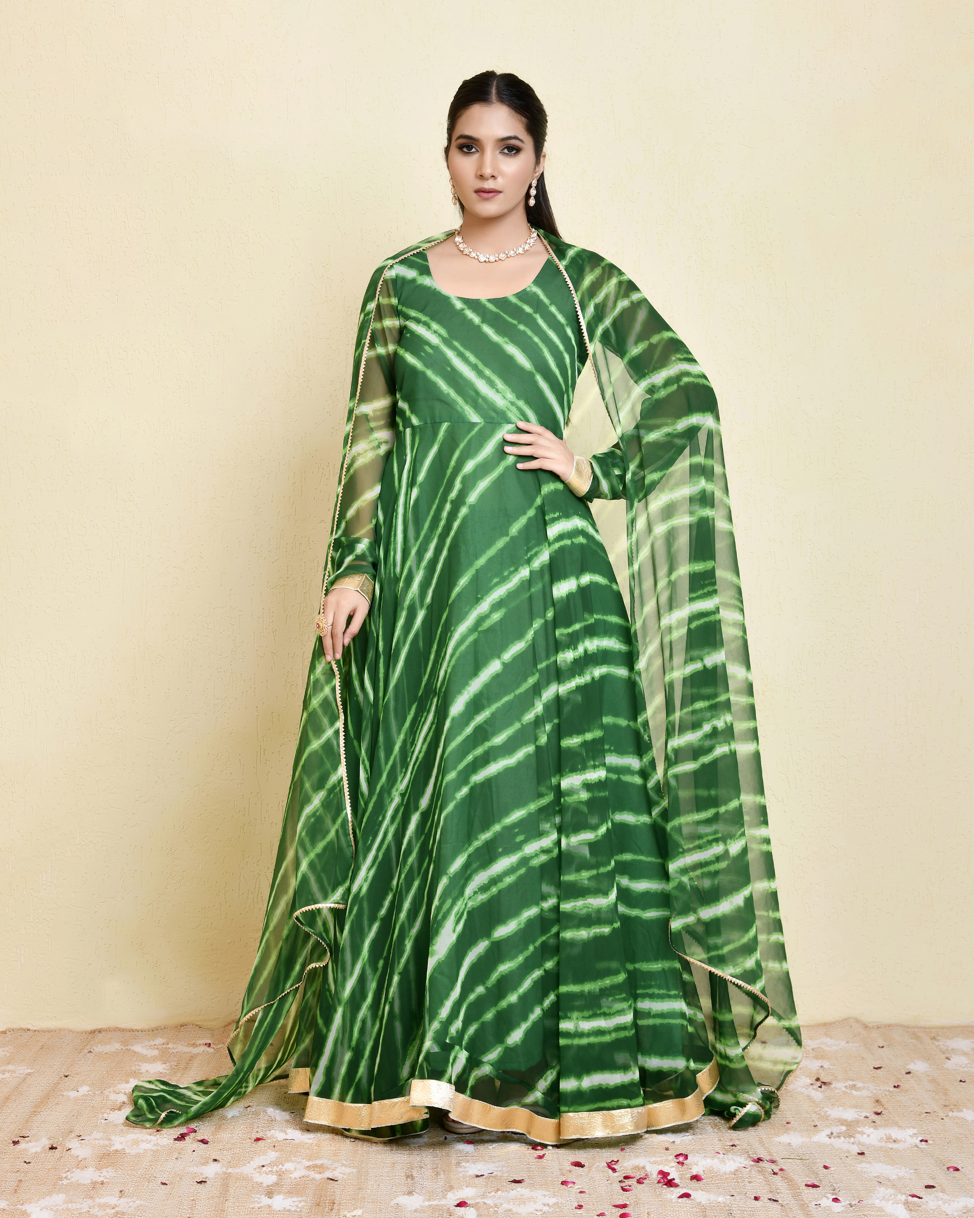 Green georgette leheriya print Anarkali set with gota lace hem, churidar sleeves and matching dupatta finished with gota borders in Golden Muslin by Priyanka Rathore