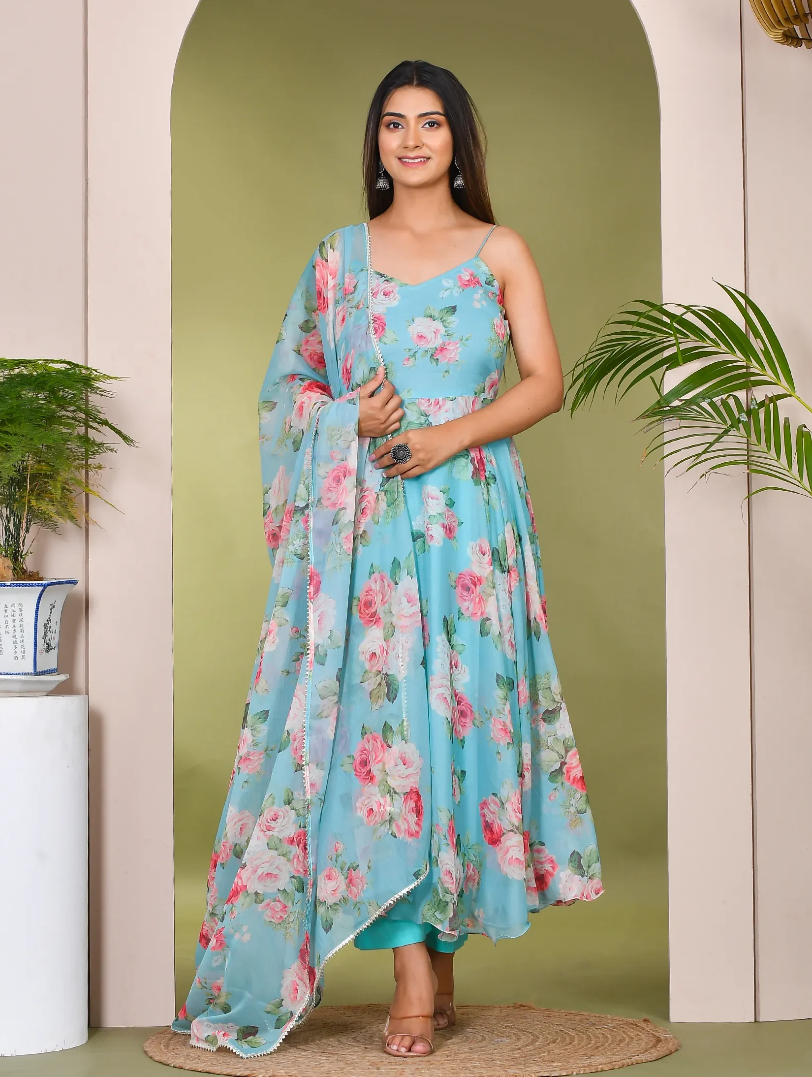 Aqua blue floral muslin suit set with soft, breathable fabric and graceful drape, designed for all-day comfort and effortless elegance in daytime and festive wear, Golden Muslin by Priyanka Rathore.