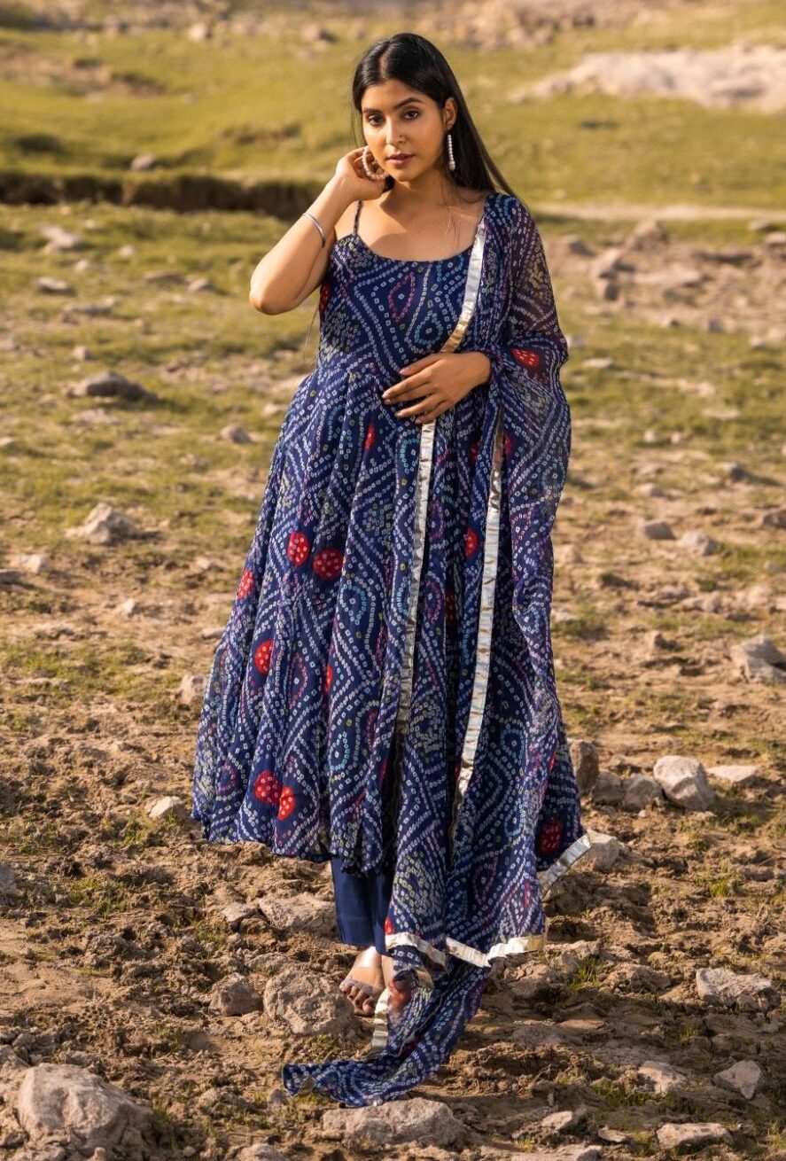 Royal blue chiffon bandhani-inspired Anarkali suit set with flowing silhouette from Golden Muslin by Priyanka Rathore