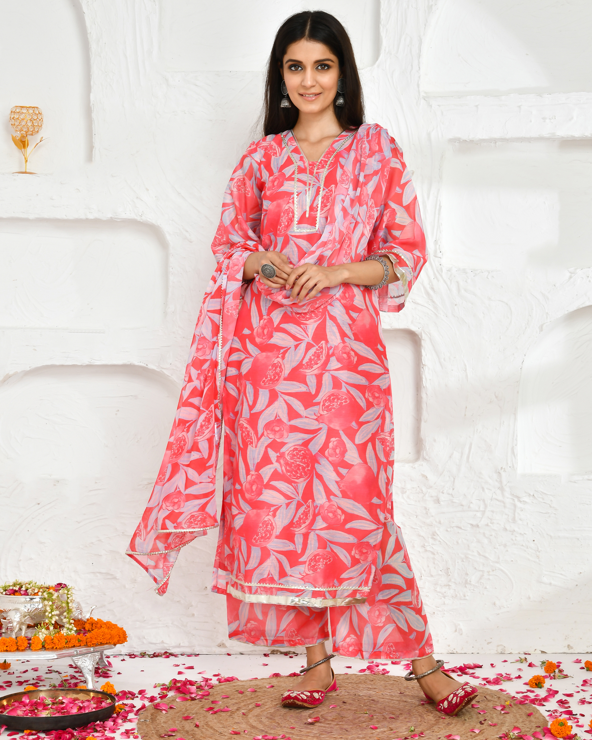 Floral printed pink chanderi kurta with gota lace, palazzo pants, and chiffon dupatta from Golden Muslin by Priyanka Rathore.