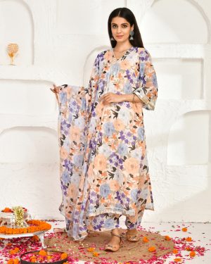 Peach floral-printed chanderi kurta with gota lace, matching palazzo pants, and a chiffon dupatta from Golden Muslin by Priyanka Rathore.