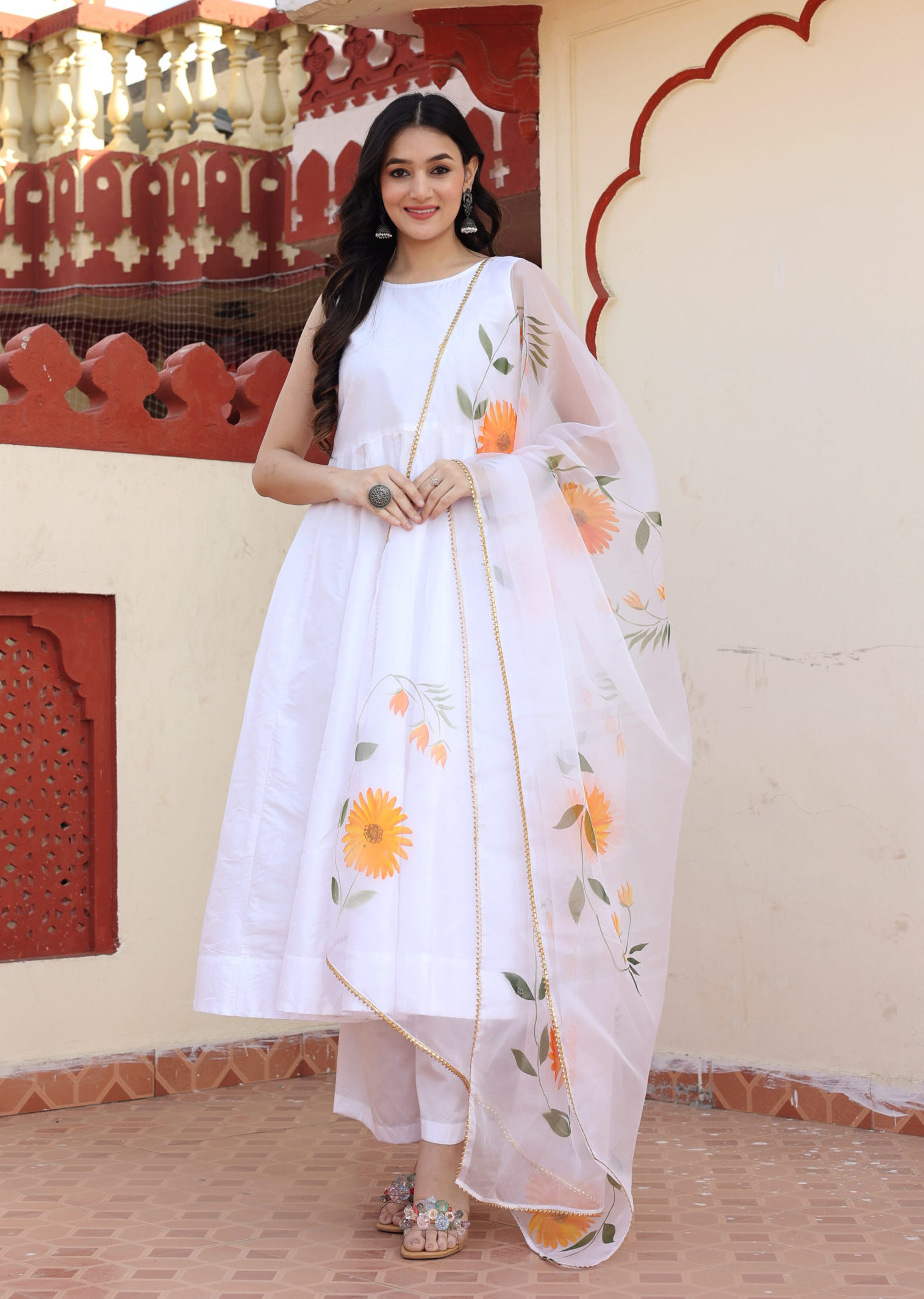 White taffeta silk anarkali in Golden Muslin by Priyanka Rathore with hand-painted organza dupatta