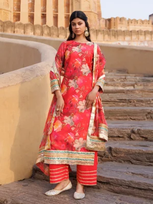 Coral Chanderi kurta set with floral prints, gota accents and subtle sequins from Golden Muslin by Priyanka Rathore