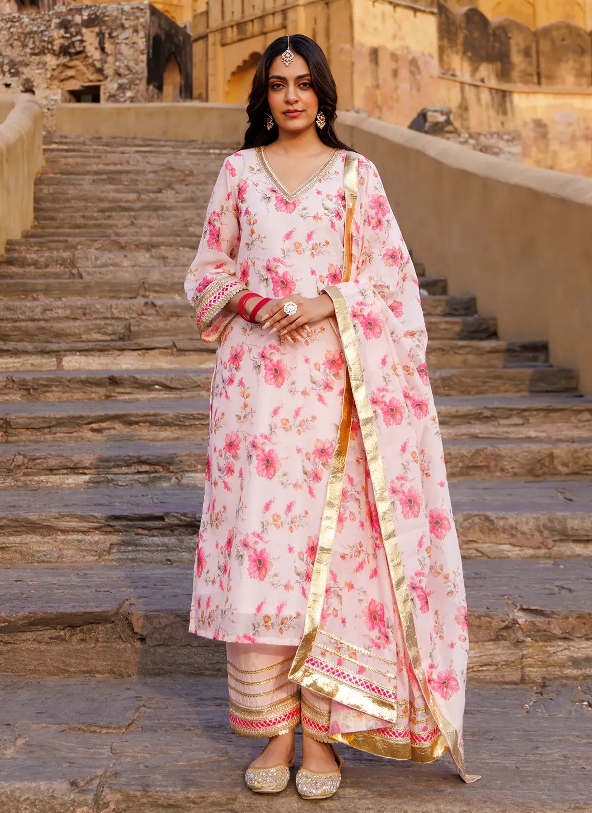 Pink Chanderi kurta set with all-over floral prints, gota accents and fine sequin work from Golden Muslin by Priyanka Rathore