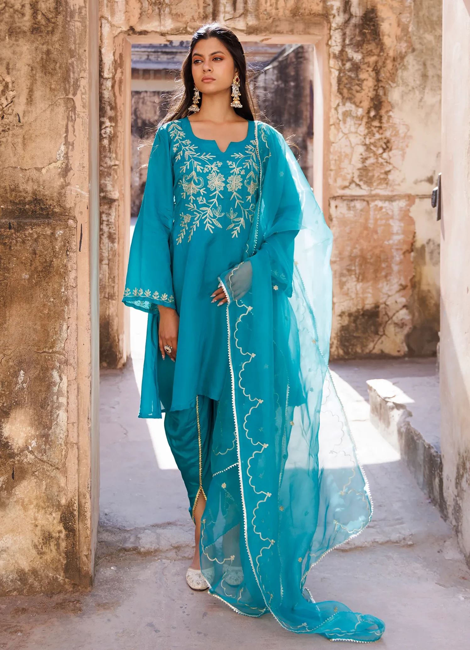 Rama green Uppada silk kurta set with intricate aari embroidery on yoke and sleeves from Golden Muslin by Priyanka Rathore