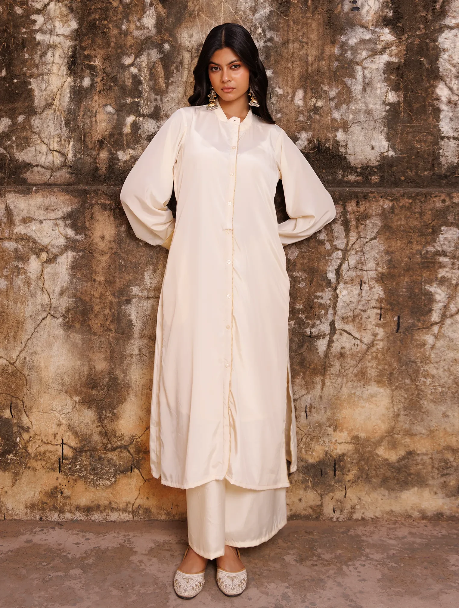 Ivory crepe co-ord set with oversized collared shirt and fluid drape from Golden Muslin by Priyanka Rathore