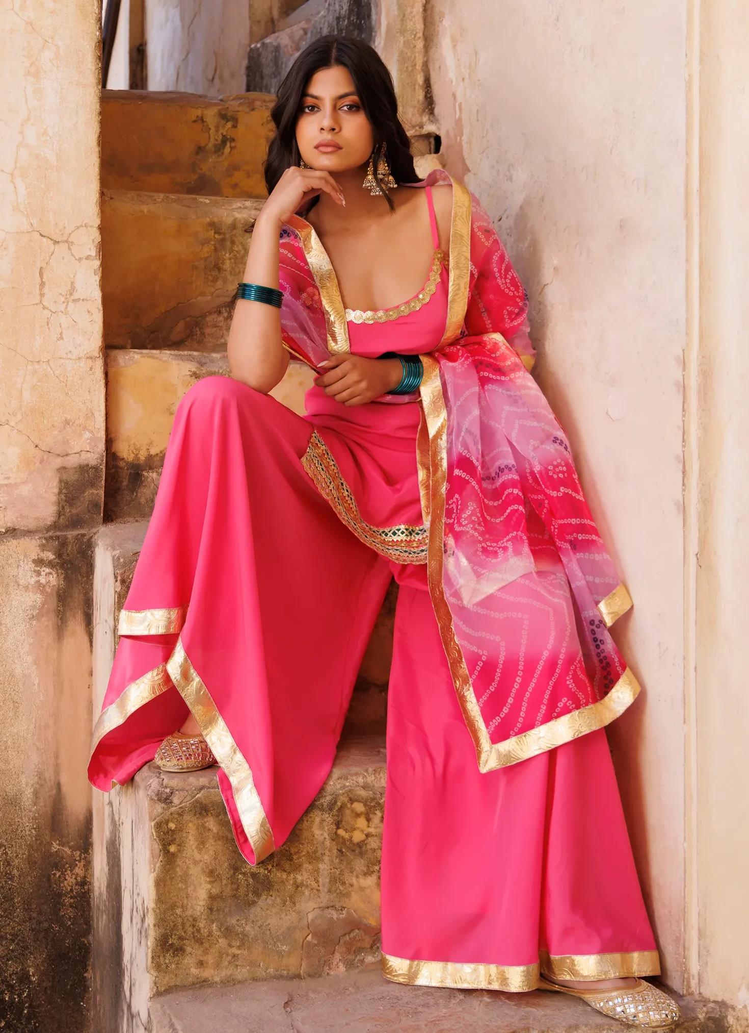 Pink crepe sharara set with strappy kurta, gota and sequin lace borders from Golden Muslin by Priyanka Rathore