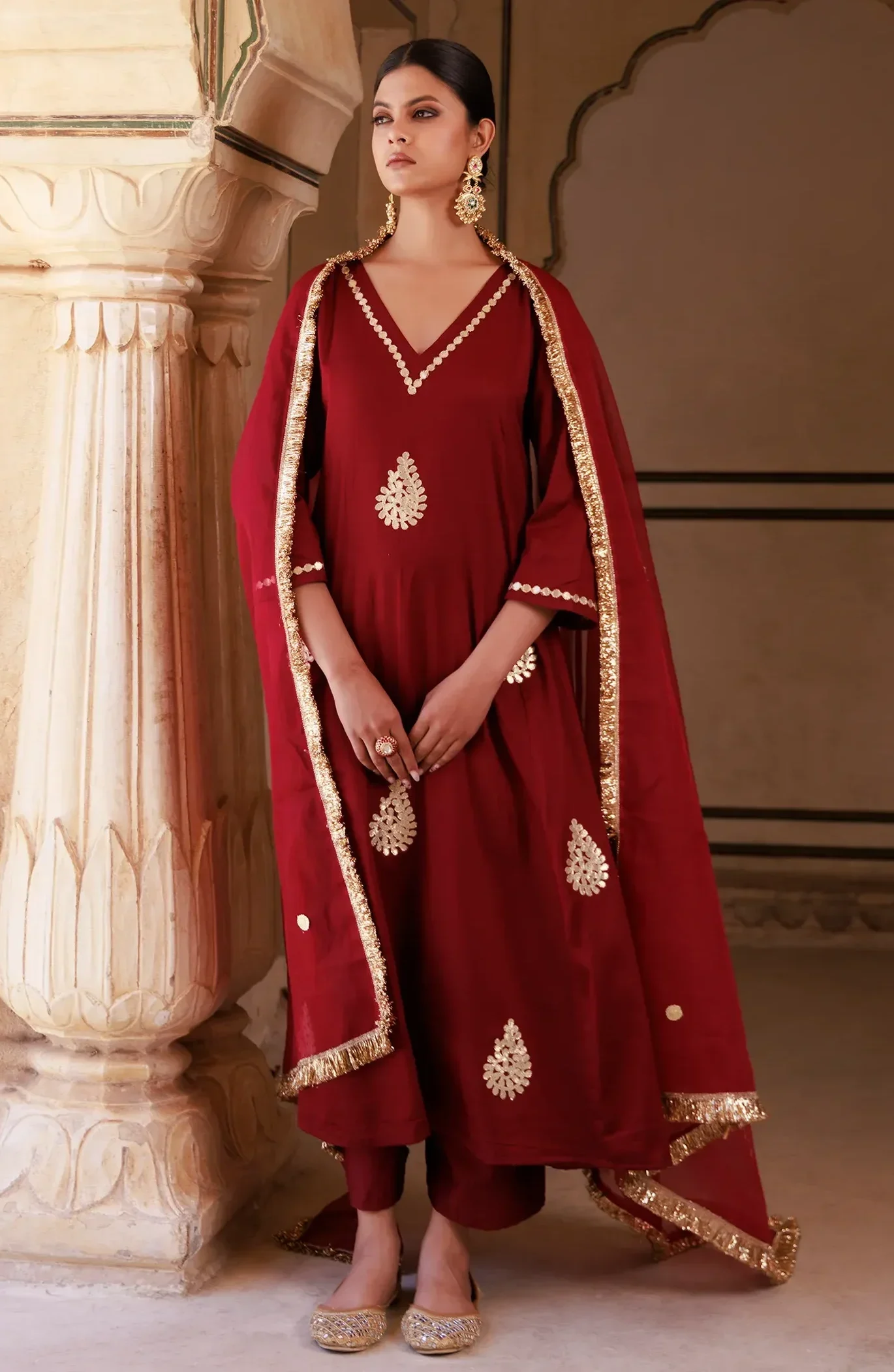 Maroon cotton silk Anarkali set with gota patti motifs and appliqué detailing from Golden Muslin by Priyanka Rathore