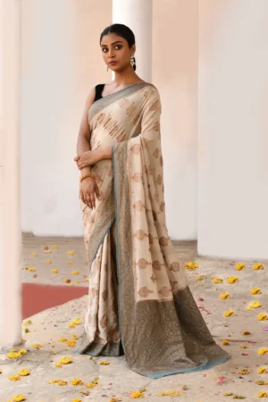 Ivory Banarasi Silk Saree with Gold Zari Buta from Golden Muslin By Naaritva Banaras