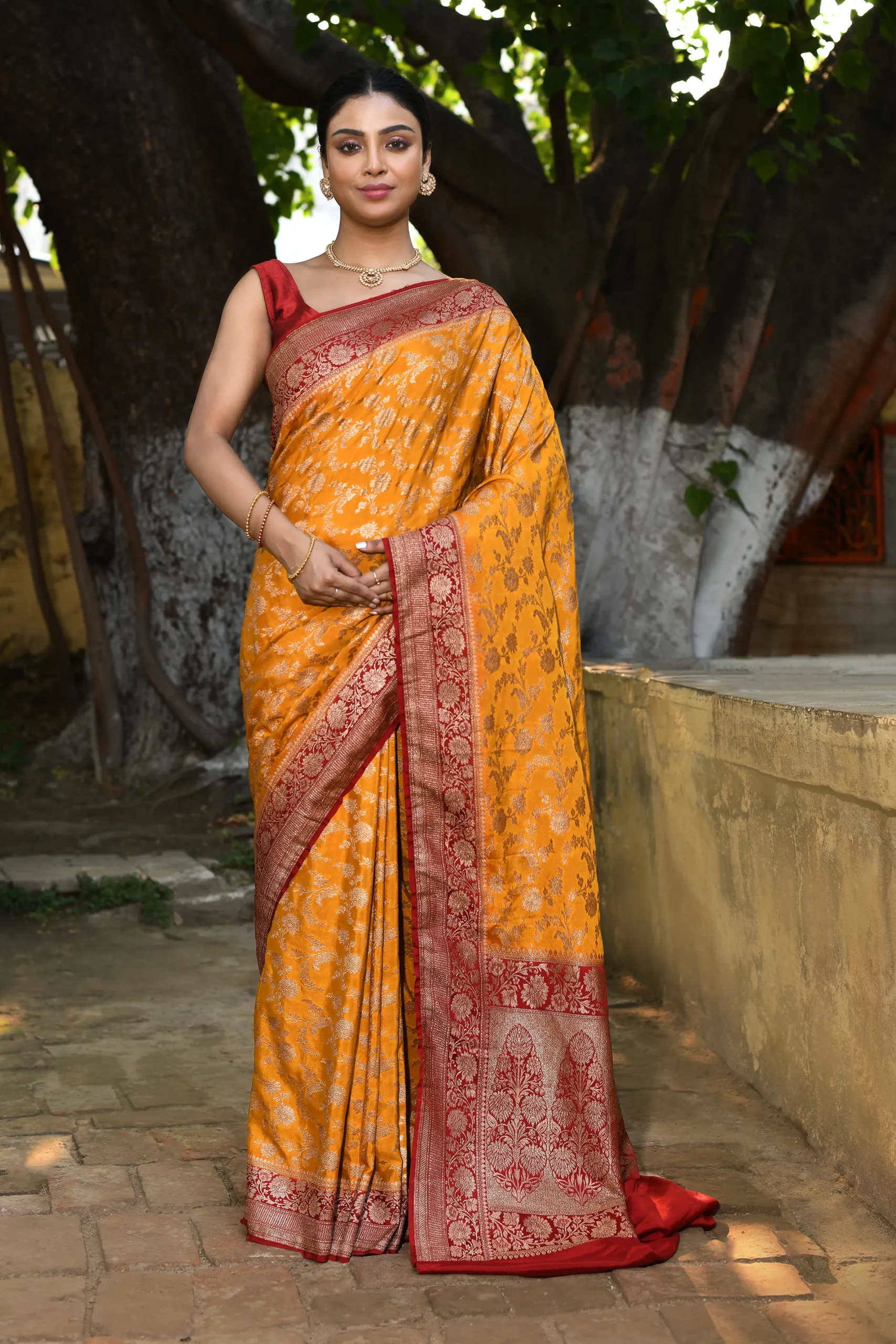 Marigold Yellow Banarasi Silk Saree with Gold Zari Floral Motifs from Golden Muslin By Naaritva Banaras