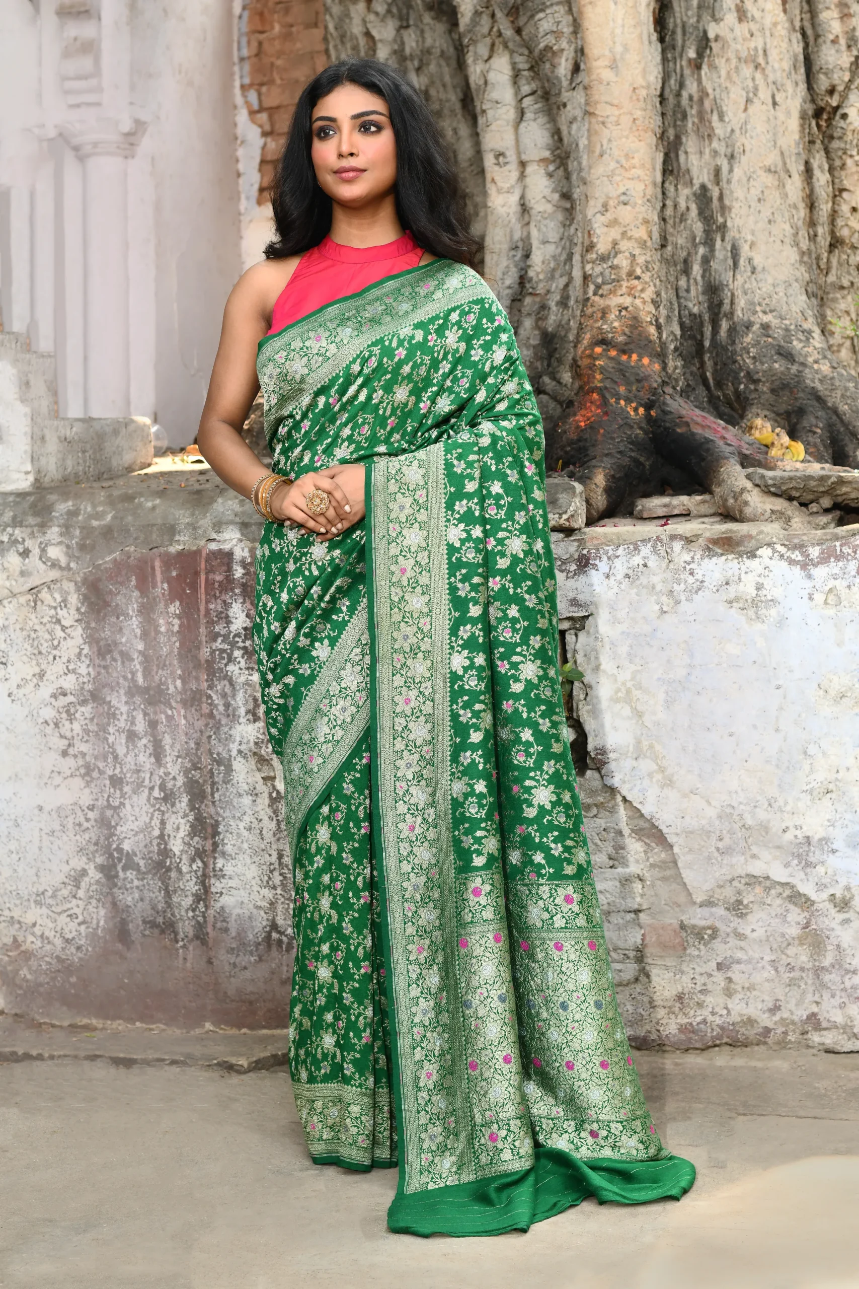 Green pure crepe silk saree with antique silver zari floral butis and ornate border from Golden Muslin By Naaritva Banaras