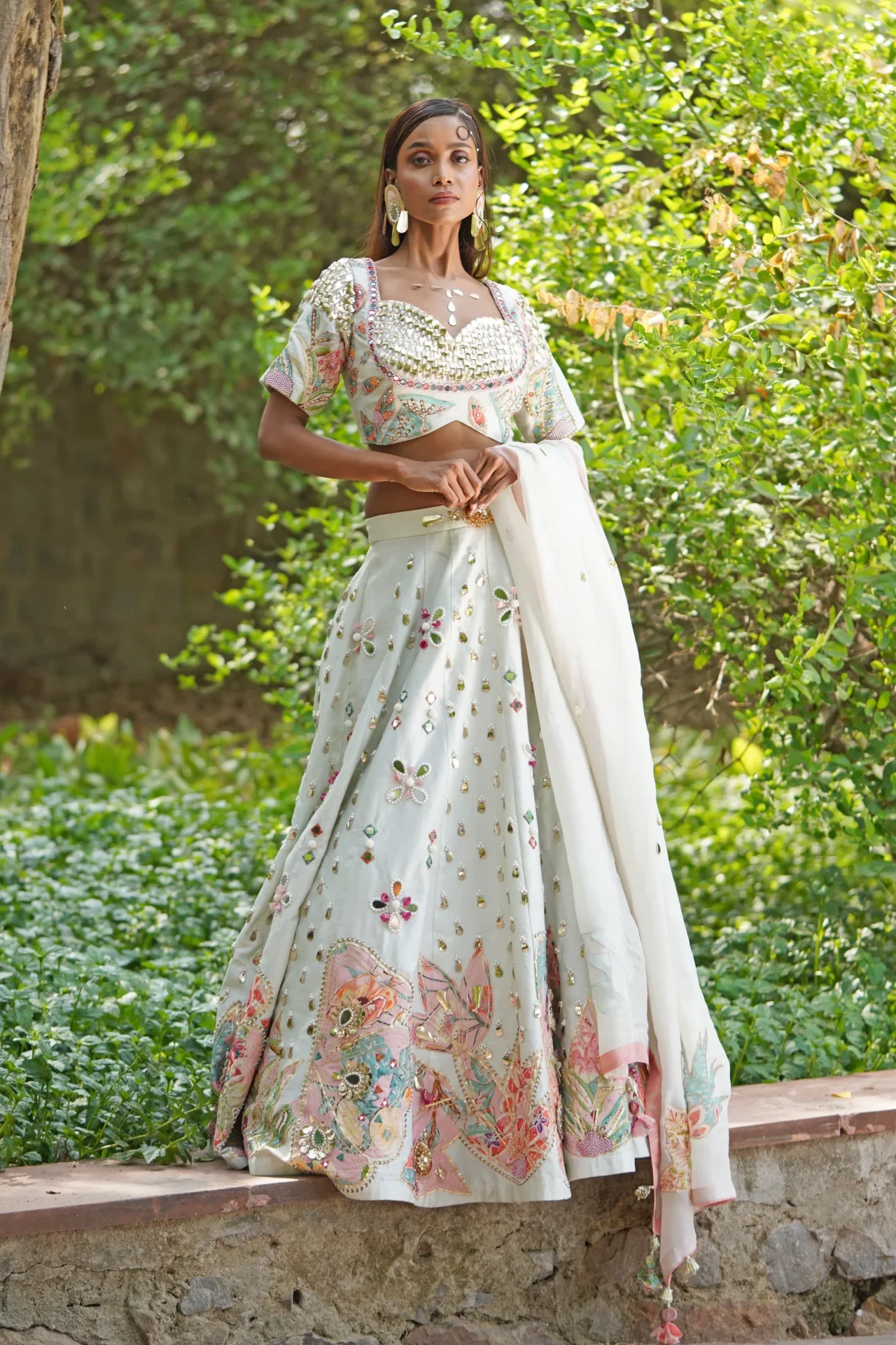 Ivory organza embroidered lehenga with sweetheart blouse from Golden Muslin By Soniya G
