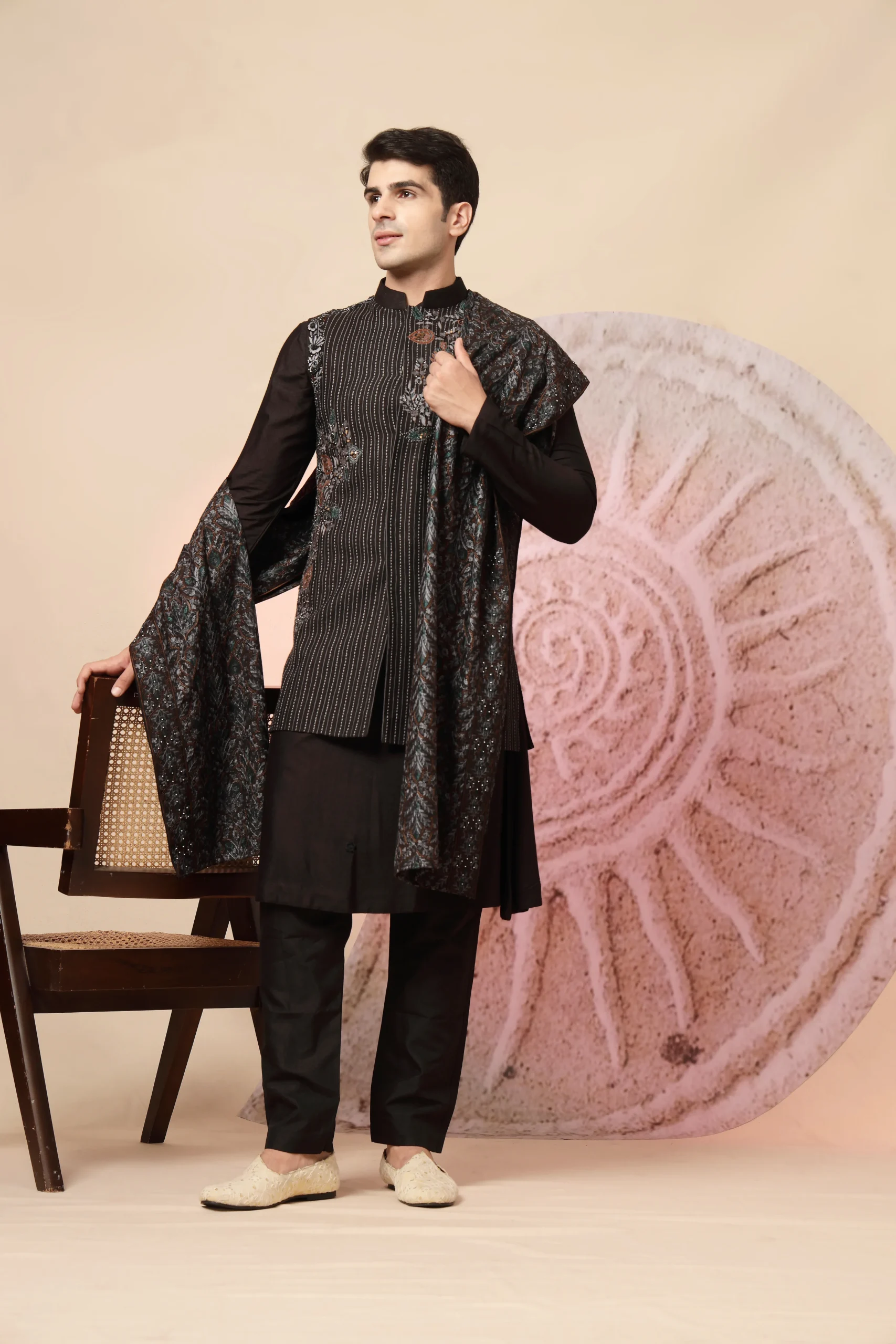 Black kurta set with striped embroidered waistcoat and dupatta from Golden Muslin By Soniya G