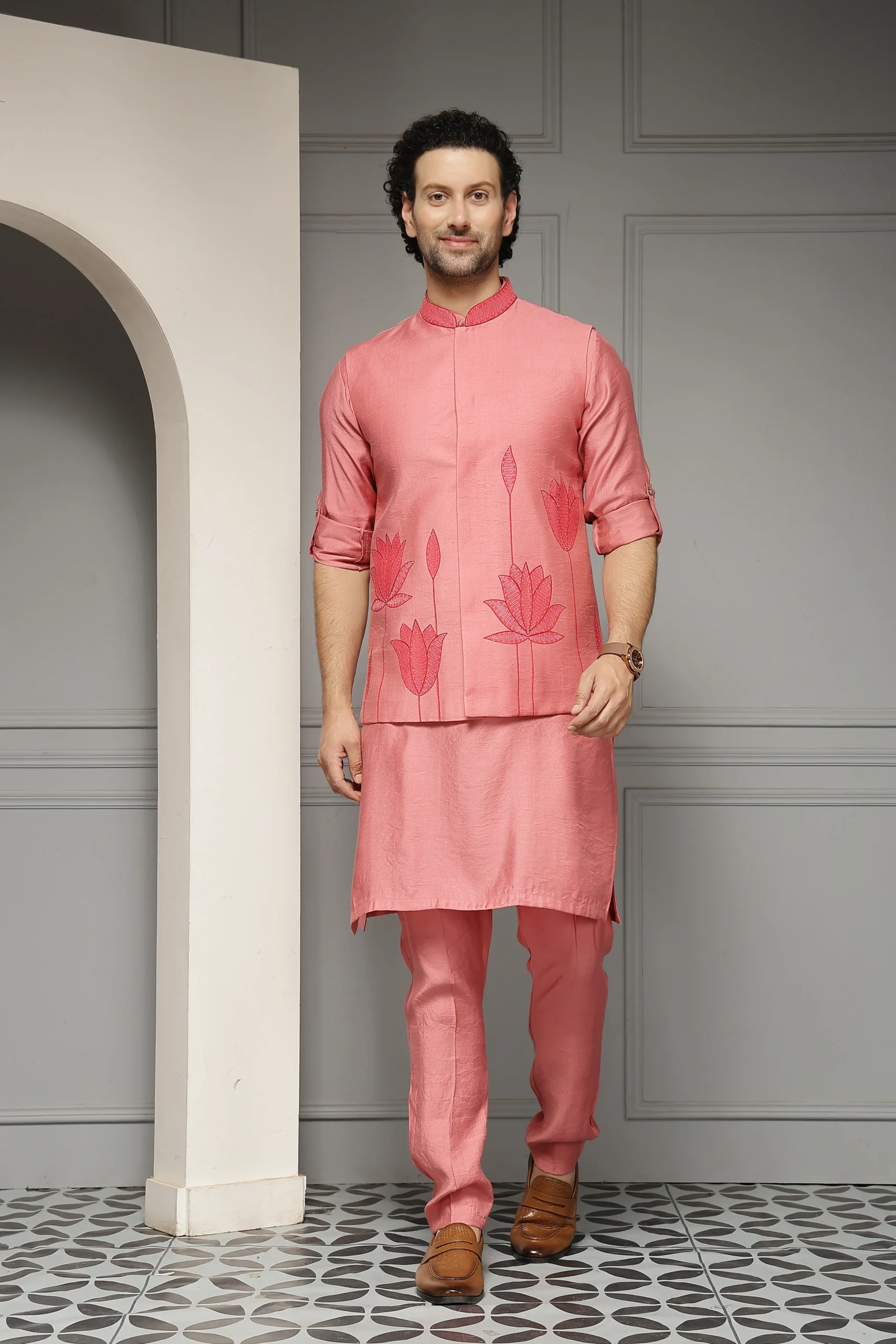 Coral pink linen-silk kurta set with embroidered Nehru jacket from Golden Muslin By Soniya G