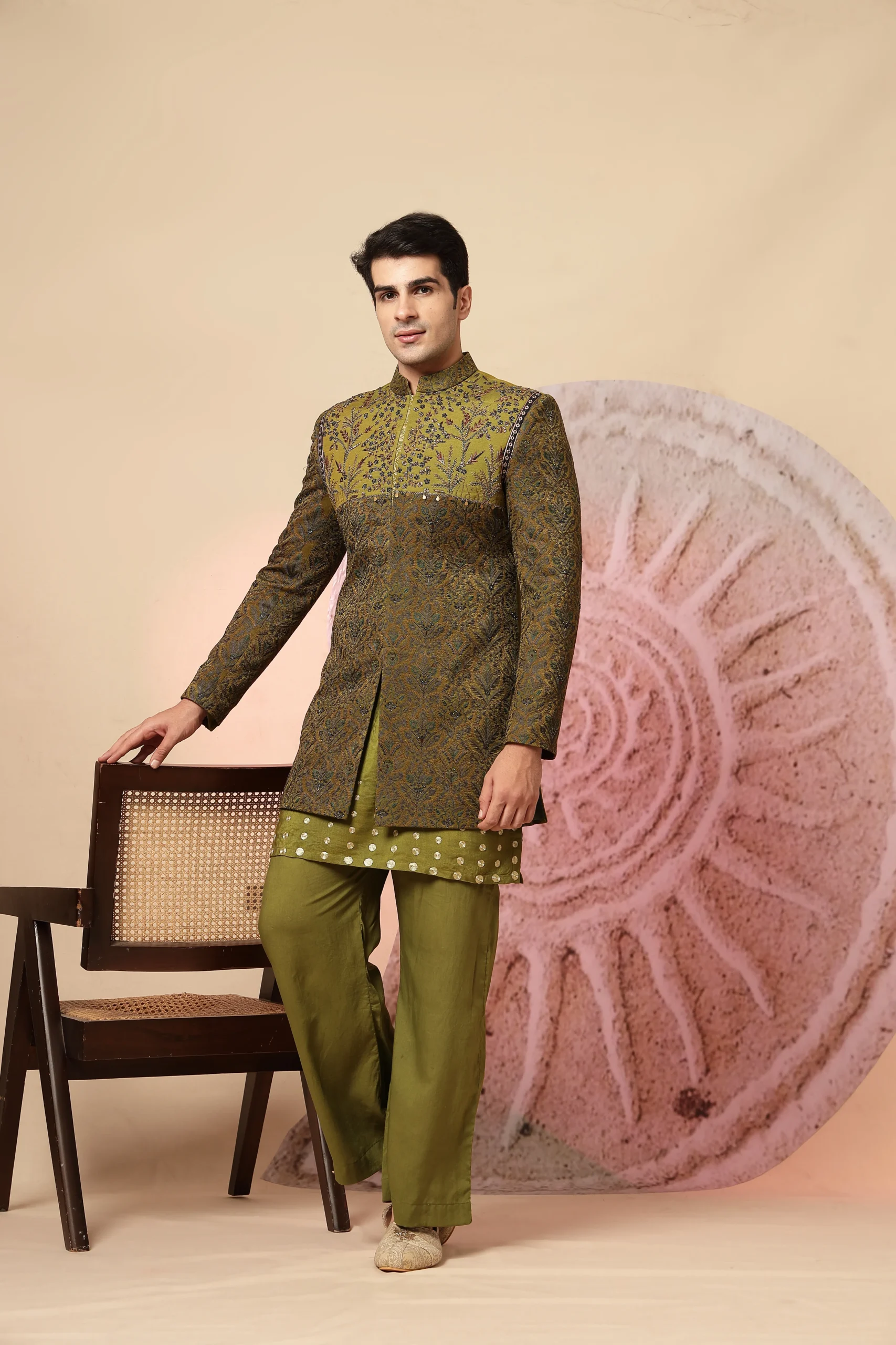 Olive green Indo-Western kurta set with richly embroidered designer jacket from Golden Muslin By Soniya G