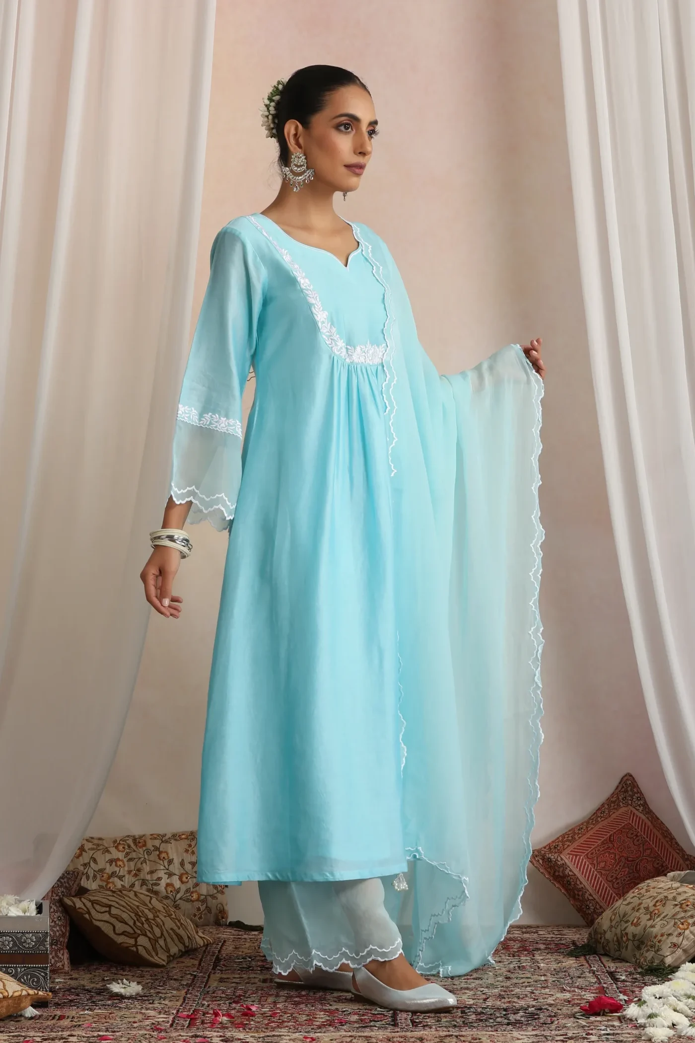 Serene pastel blue ethnic ensemble with relaxed silhouette from Golden Muslin By Suikala