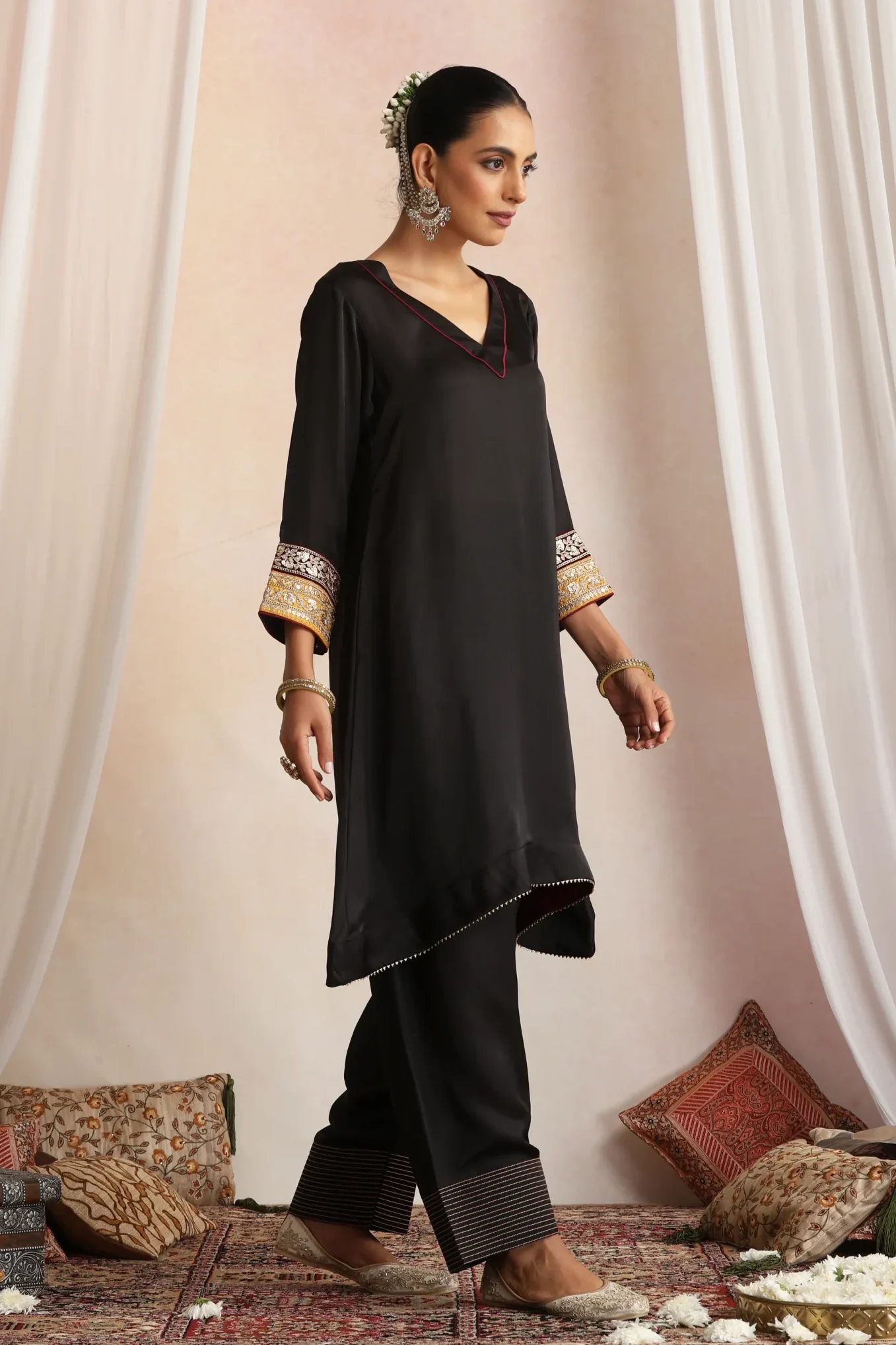 Elegant black ethnic kurta set with gold embroidered cuffs from Golden Muslin By Suikala