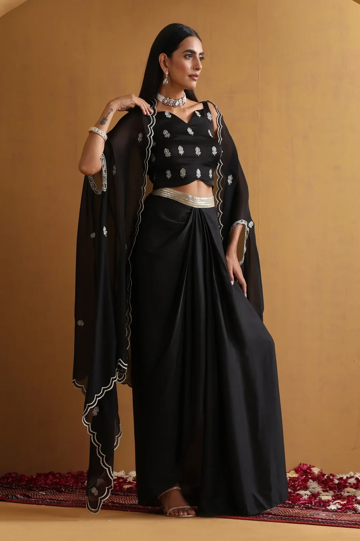 Stunning black embellished skirt set with sheer dupatta from Golden Muslin By Suikala