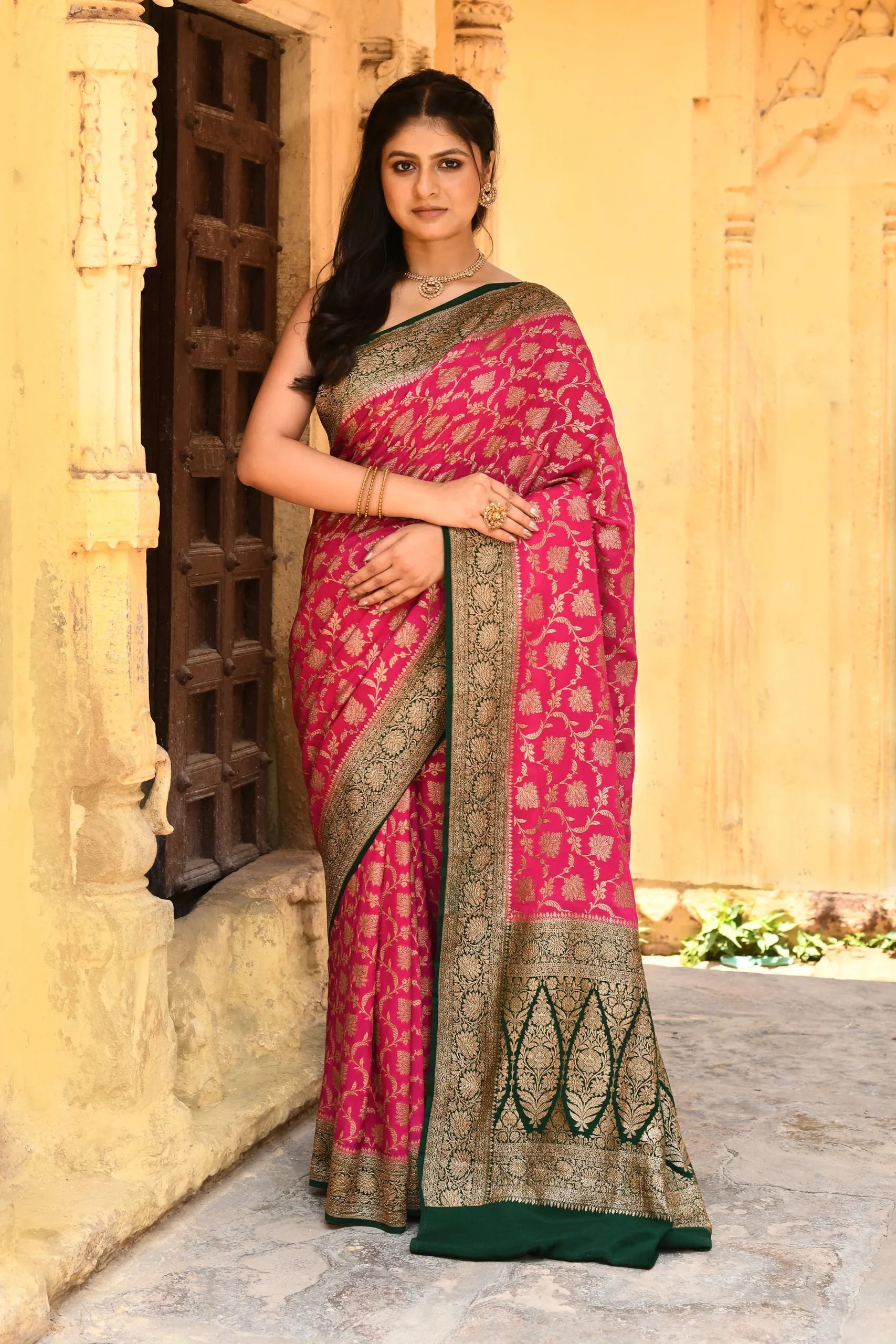Fuchsia Banarasi Crepe Chiffon Silk Saree with Gold Zari Jaal Butti from Golden Muslin By Naaritva Banaras