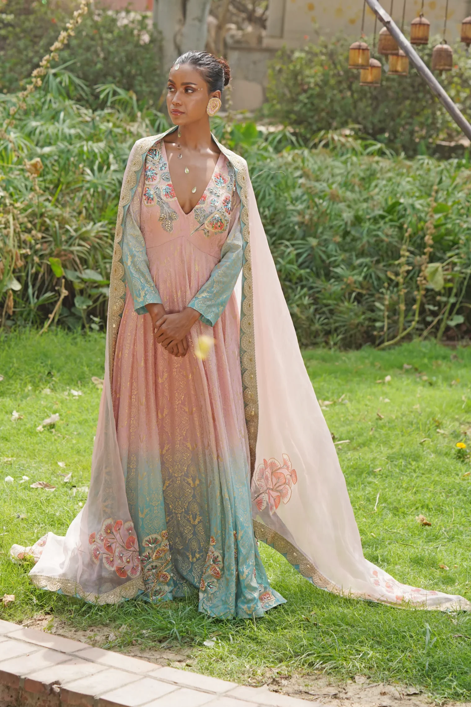 Pastel green embroidered Anarkali gown with cape and dupatta from Golden Muslin By Soniya G