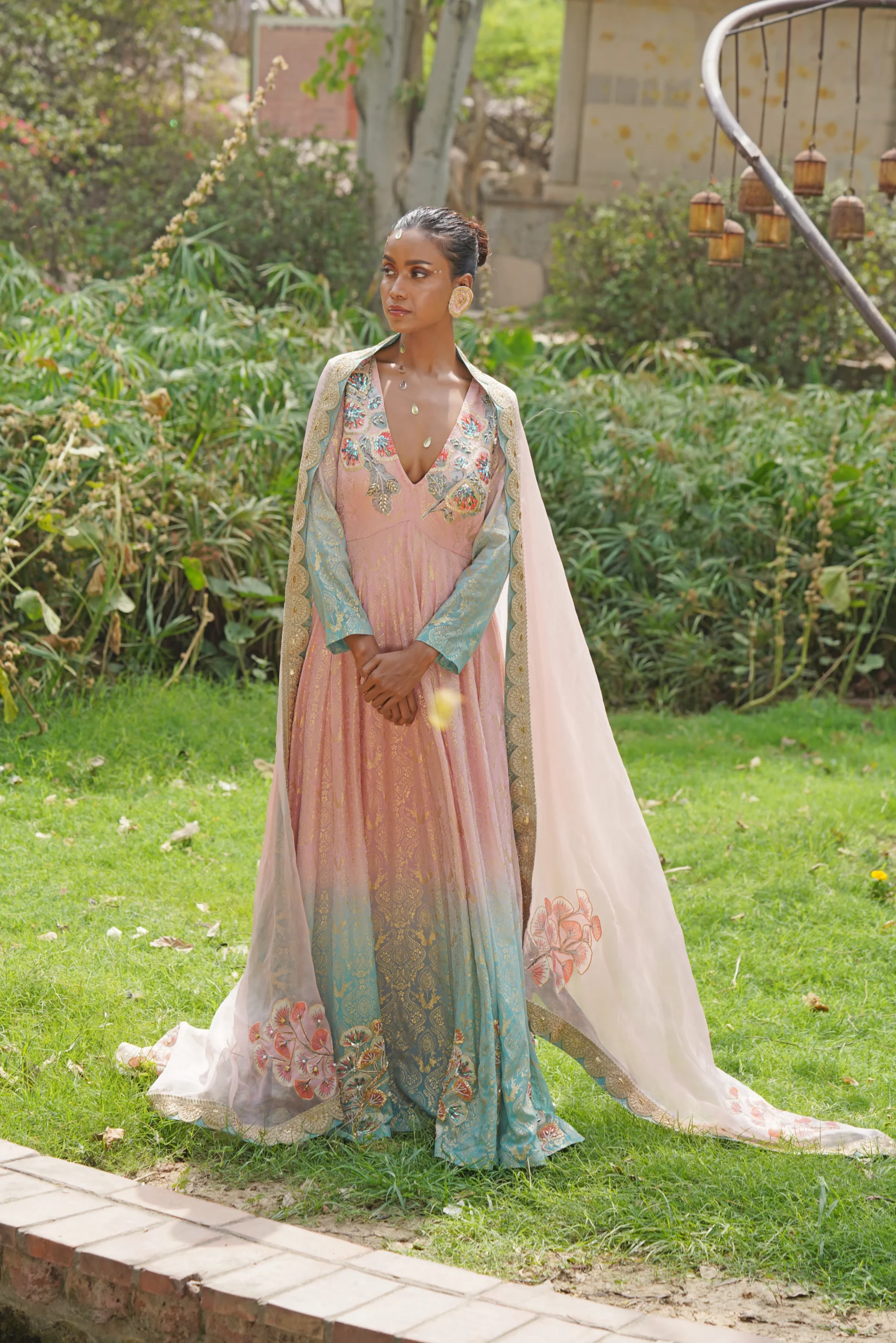 Pastel green embroidered Anarkali gown with cape and dupatta from Golden Muslin By Soniya G
