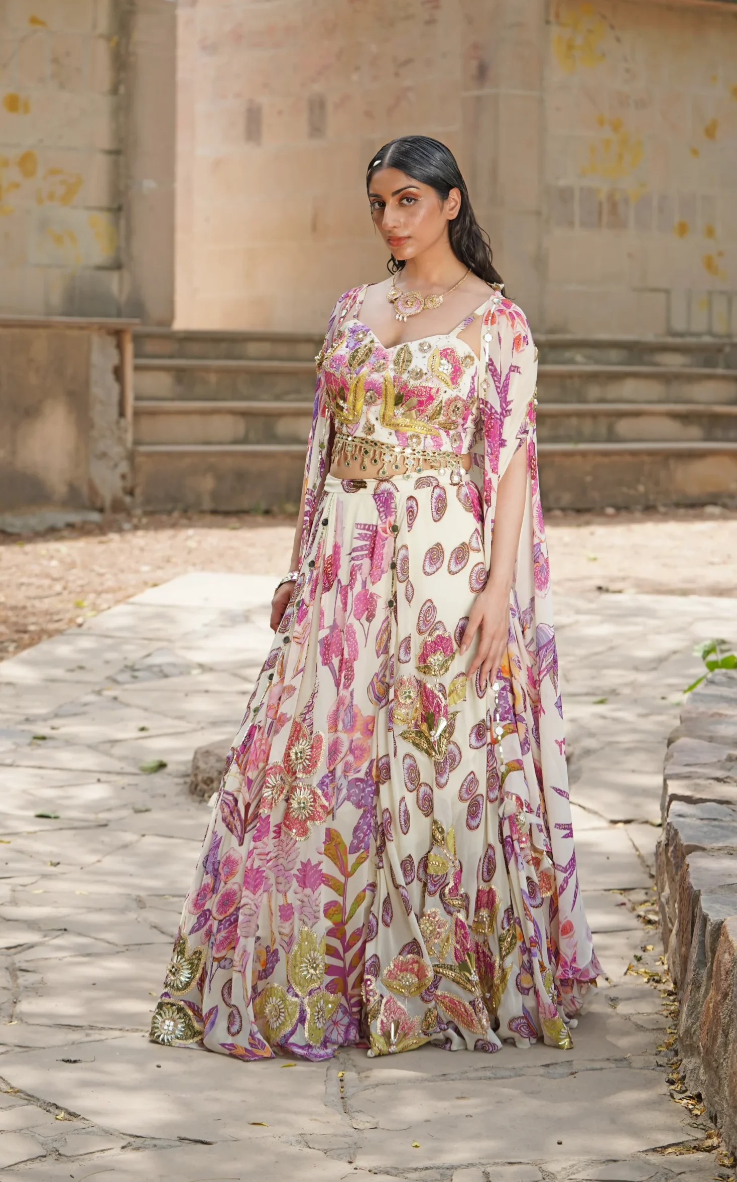 Pastel floral lehenga with sweetheart blouse and cape from Golden Muslin By Soniya G